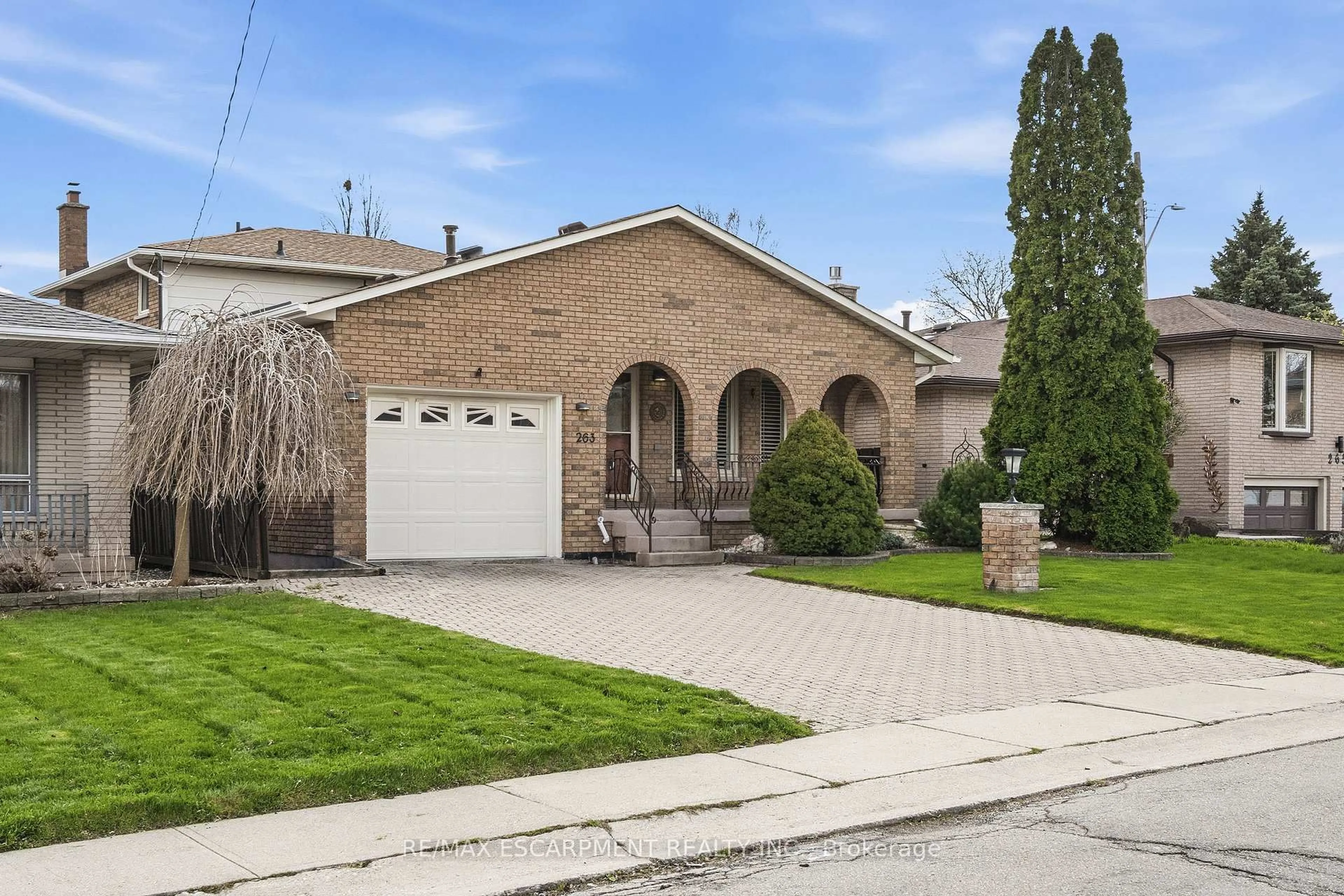 Home with brick exterior material, street for 263 Guildwood Dr, Hamilton Ontario L9C 6W7