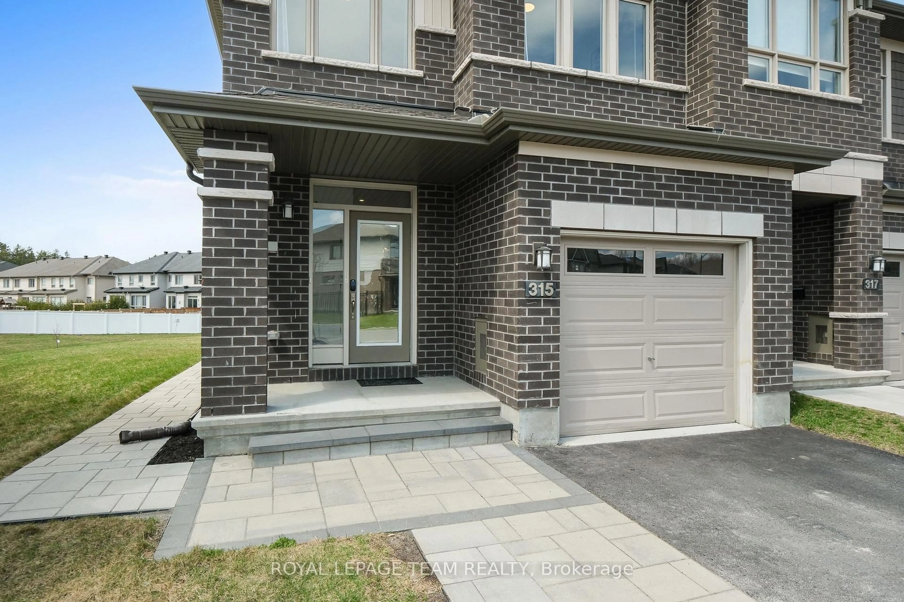 Home with brick exterior material, street for 315 Big Dipper St, Ottawa Ontario K4M 0J2