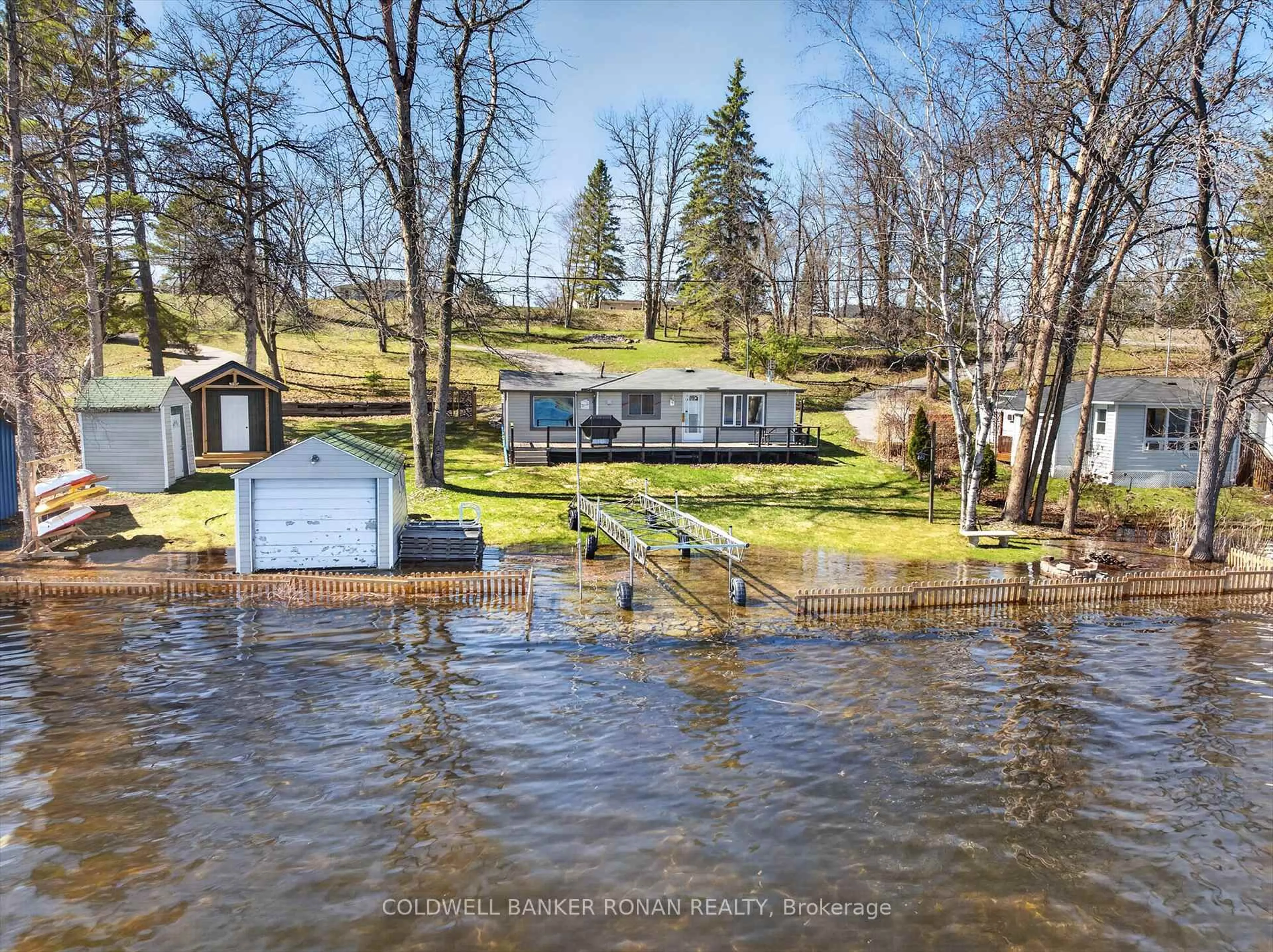 A pic from outside/outdoor area/front of a property/back of a property/a pic from drone, water/lake/river/ocean view for 1853 Youngs Point Rd, Selwyn Ontario K0L 2H0