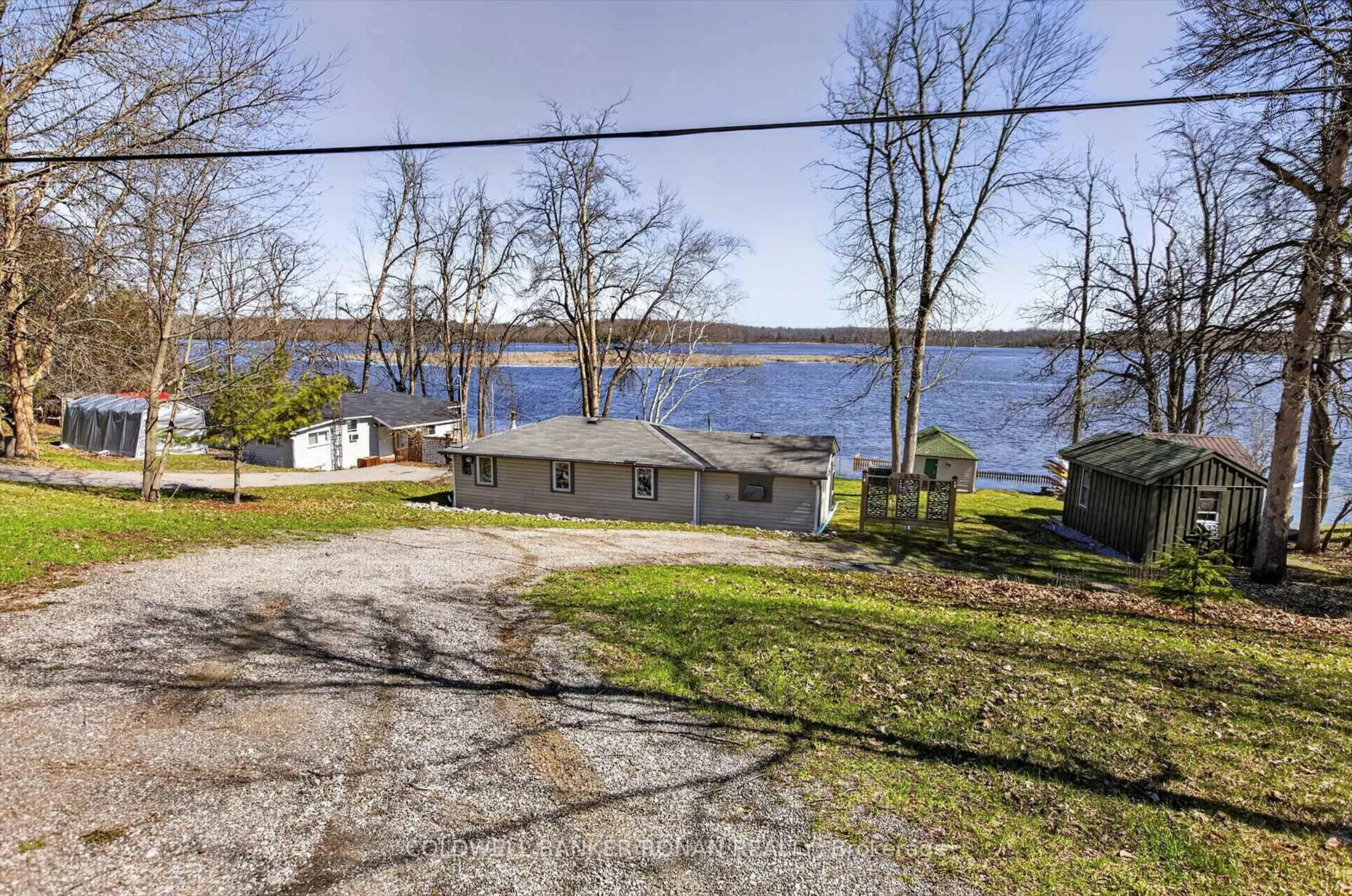 A pic from outside/outdoor area/front of a property/back of a property/a pic from drone, water/lake/river/ocean view for 1853 Youngs Point Rd, Selwyn Ontario K0L 2H0