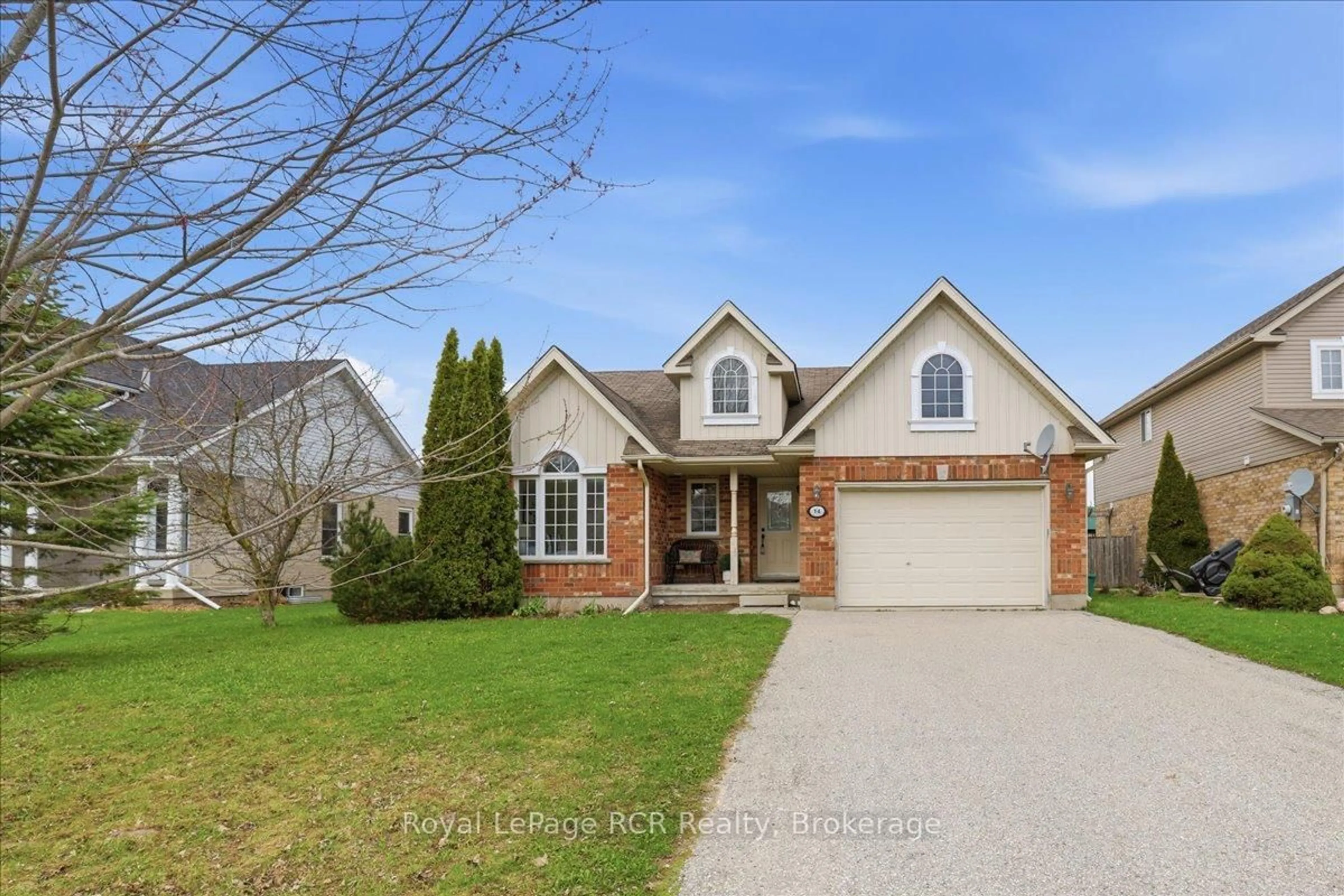 Home with brick exterior material, street for 14 Parkside St, Mapleton Ontario N0G 1B0