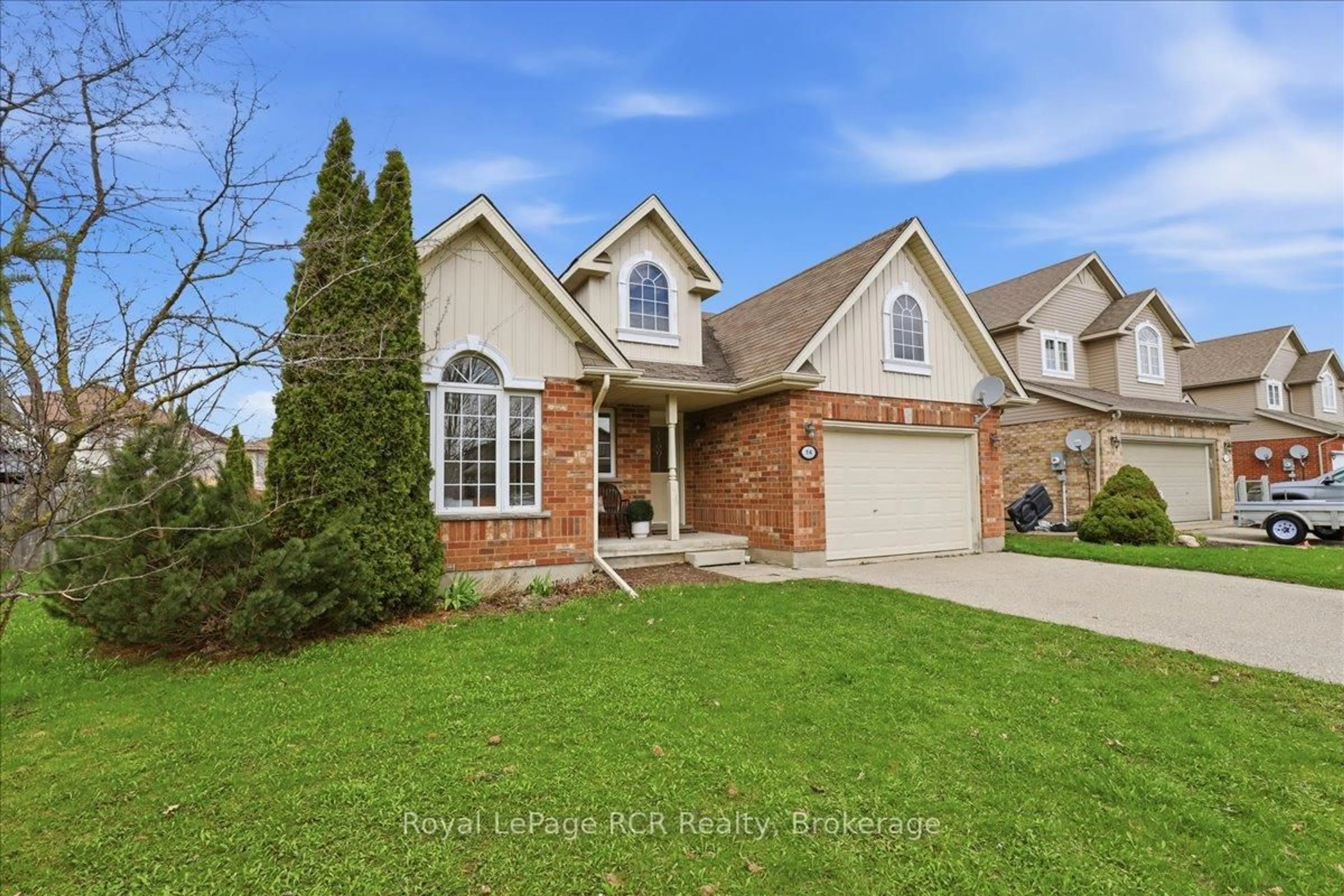 Home with brick exterior material, street for 14 Parkside St, Mapleton Ontario N0G 1B0