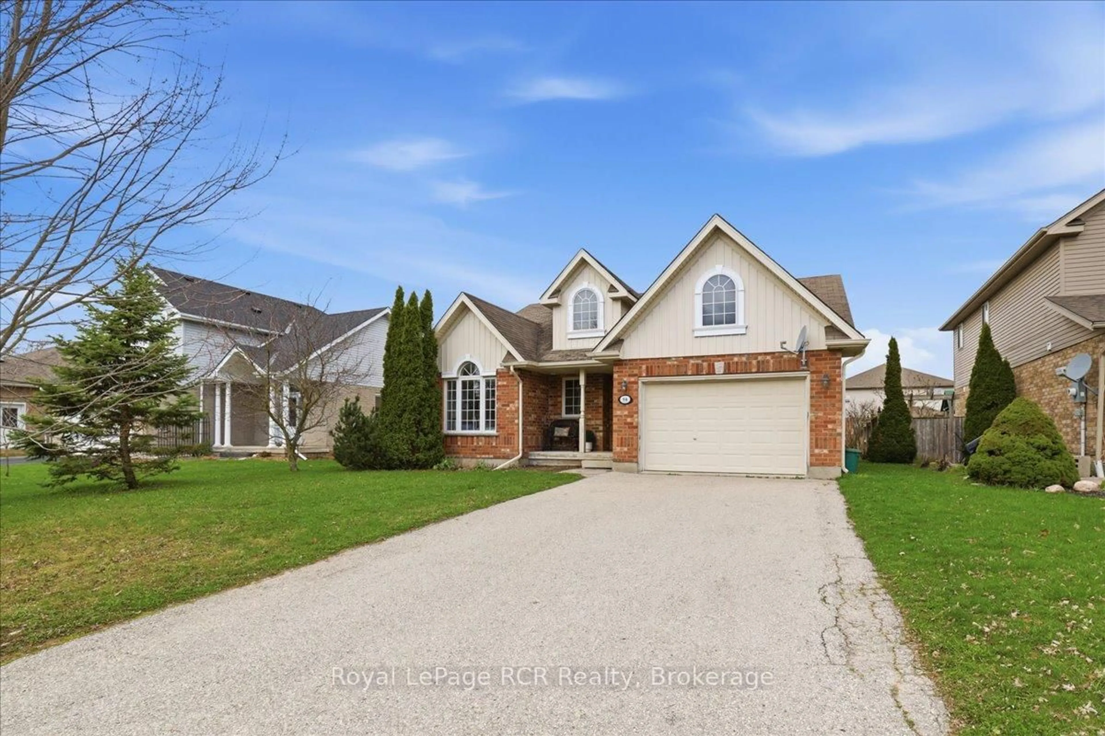 Home with brick exterior material, street for 14 Parkside St, Mapleton Ontario N0G 1B0