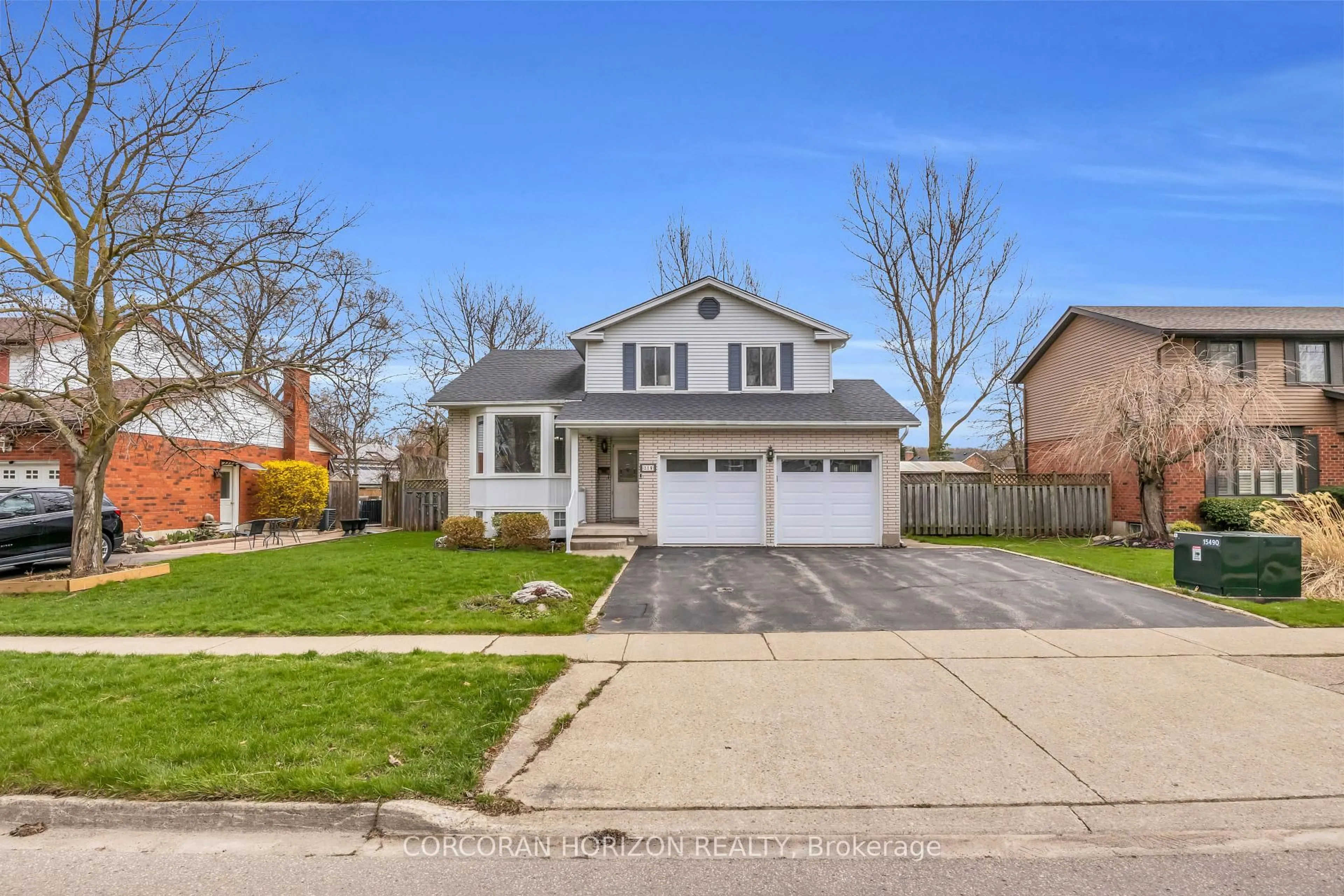 Home with vinyl exterior material, street for 318 Burnett Ave, Cambridge Ontario N1T 1G6