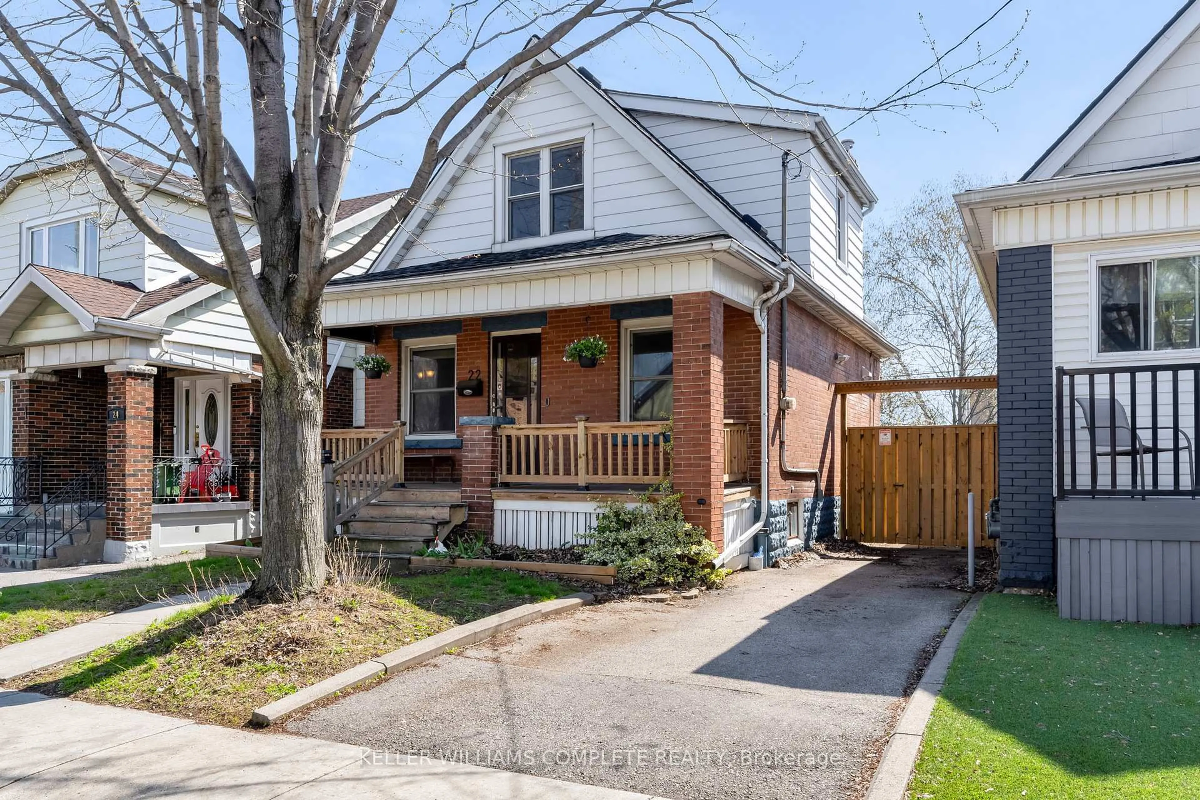 Home with brick exterior material, street for 22 COPE St, Hamilton Ontario L8H 5A9