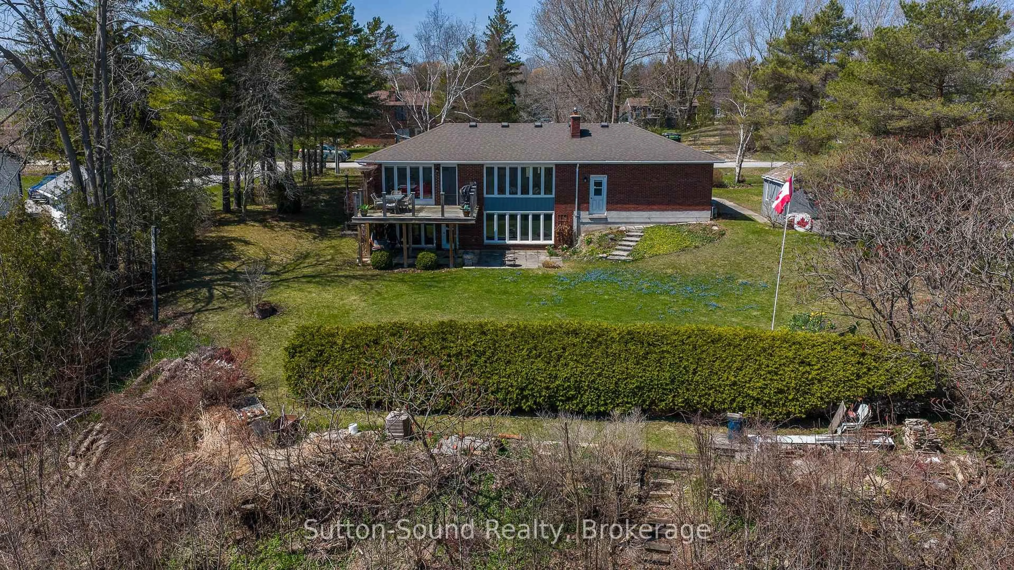 A pic from outside/outdoor area/front of a property/back of a property/a pic from drone, water/lake/river/ocean view for 173 Lakeview Cres, Georgian Bluffs Ontario N4K 0G2
