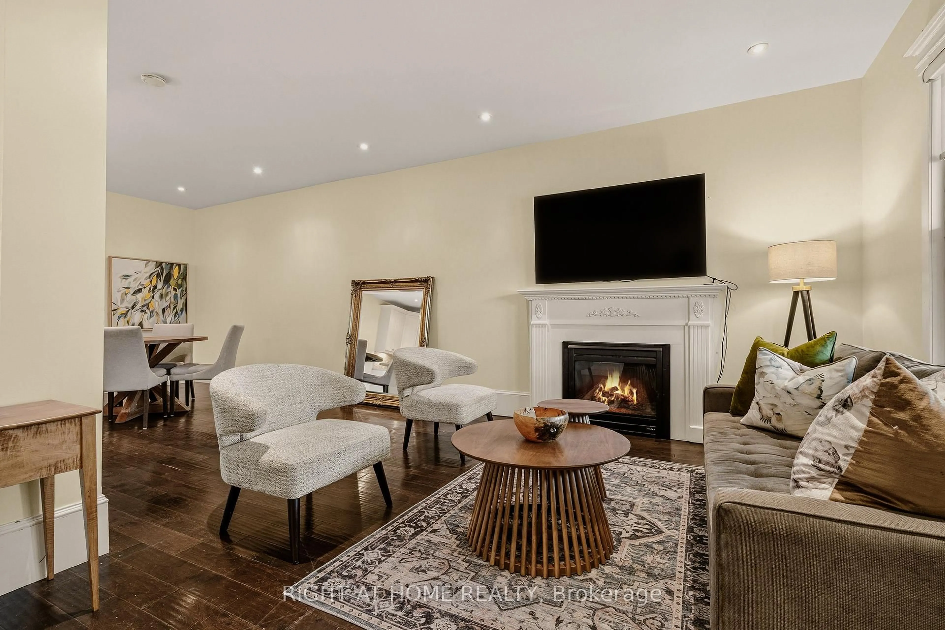 Living room with furniture, wood/laminate floor for 104 Barnesdale Ave, Hamilton Ontario L8L 6S5