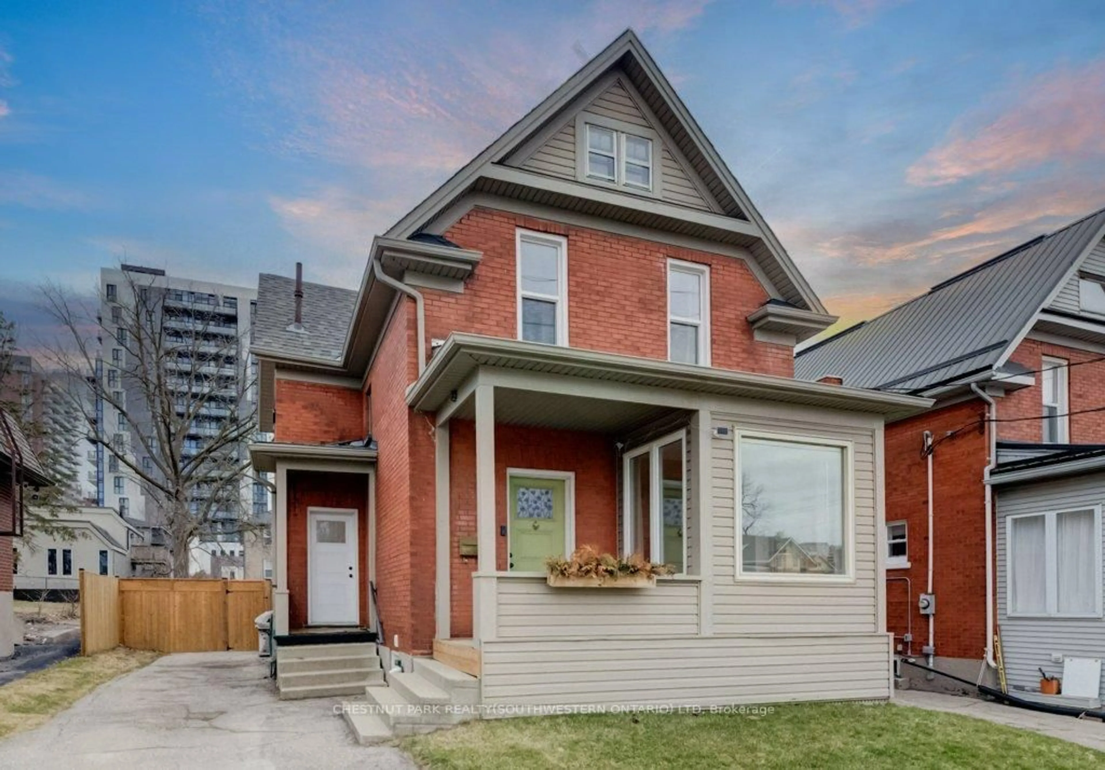 Home with brick exterior material, street for 8 Spring St, Waterloo Ontario N2J 2L8