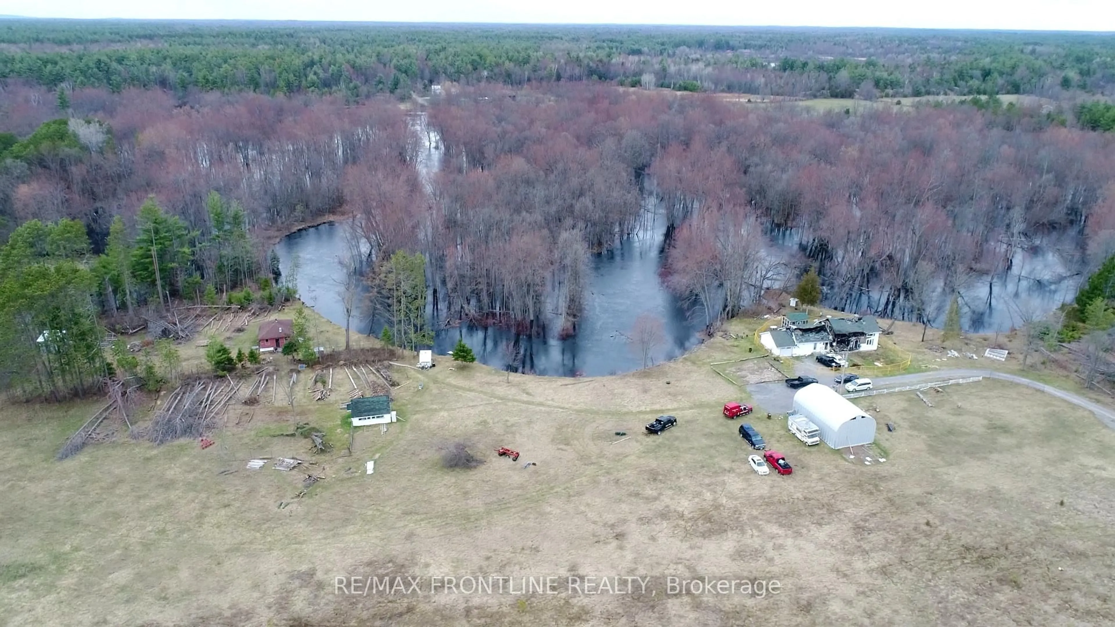 A pic from outside/outdoor area/front of a property/back of a property/a pic from drone, water/lake/river/ocean view for 109585 HIGHWAY 7 Highway, Tweed Ontario K0K 3J0