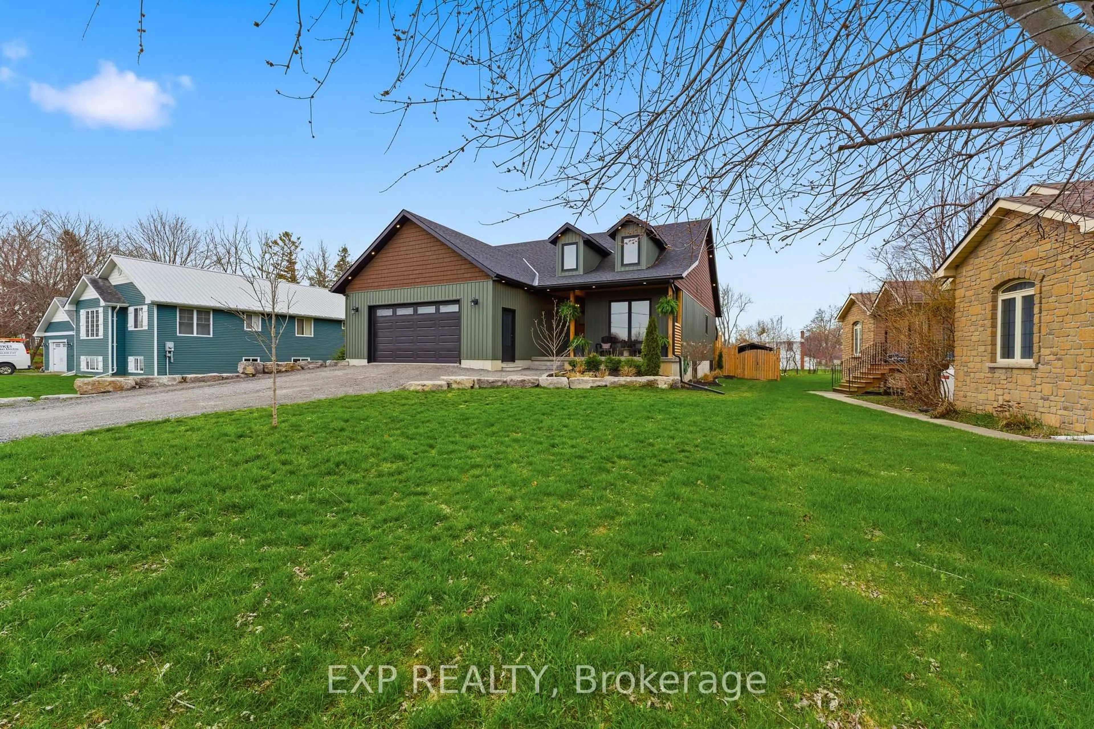 A pic from outside/outdoor area/front of a property/back of a property/a pic from drone, water/lake/river/ocean view for 11 Lipson Ave, Prince Edward County Ontario K0K 1T0