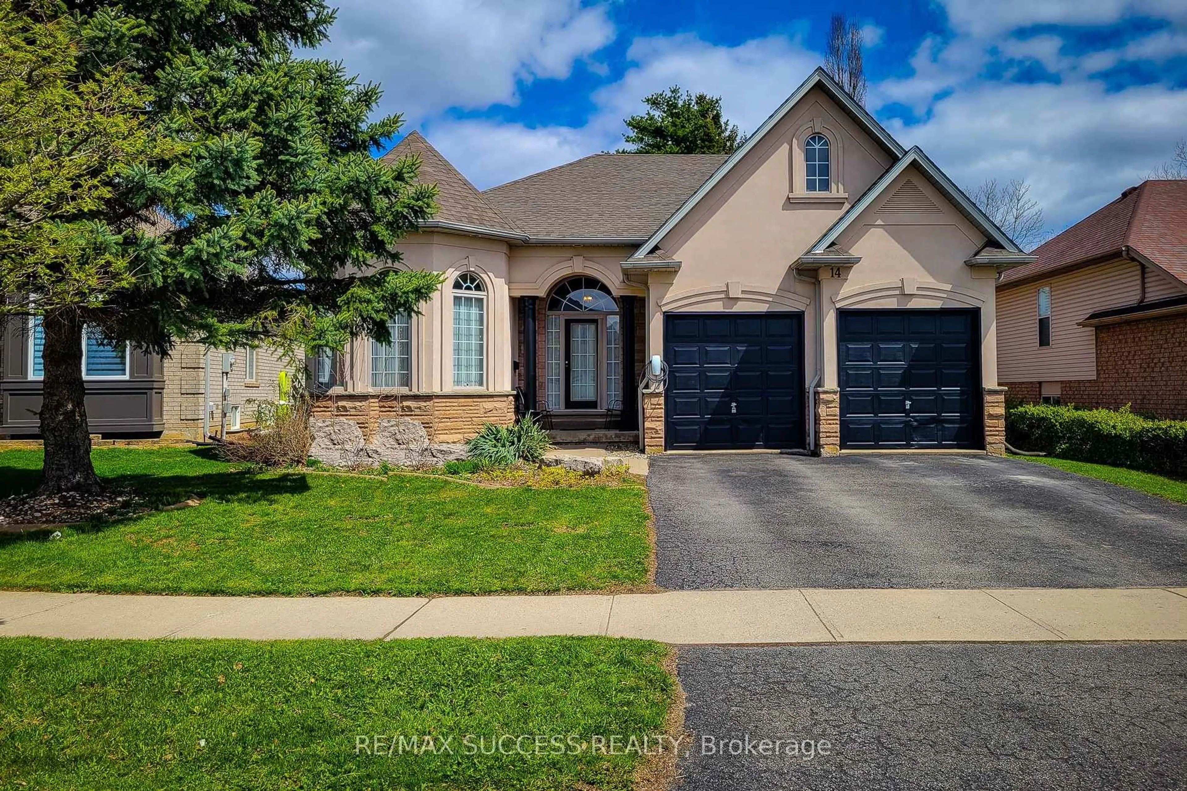 Home with brick exterior material, street for 14 Casson Lane, Brantford Ontario N3R 7Z4