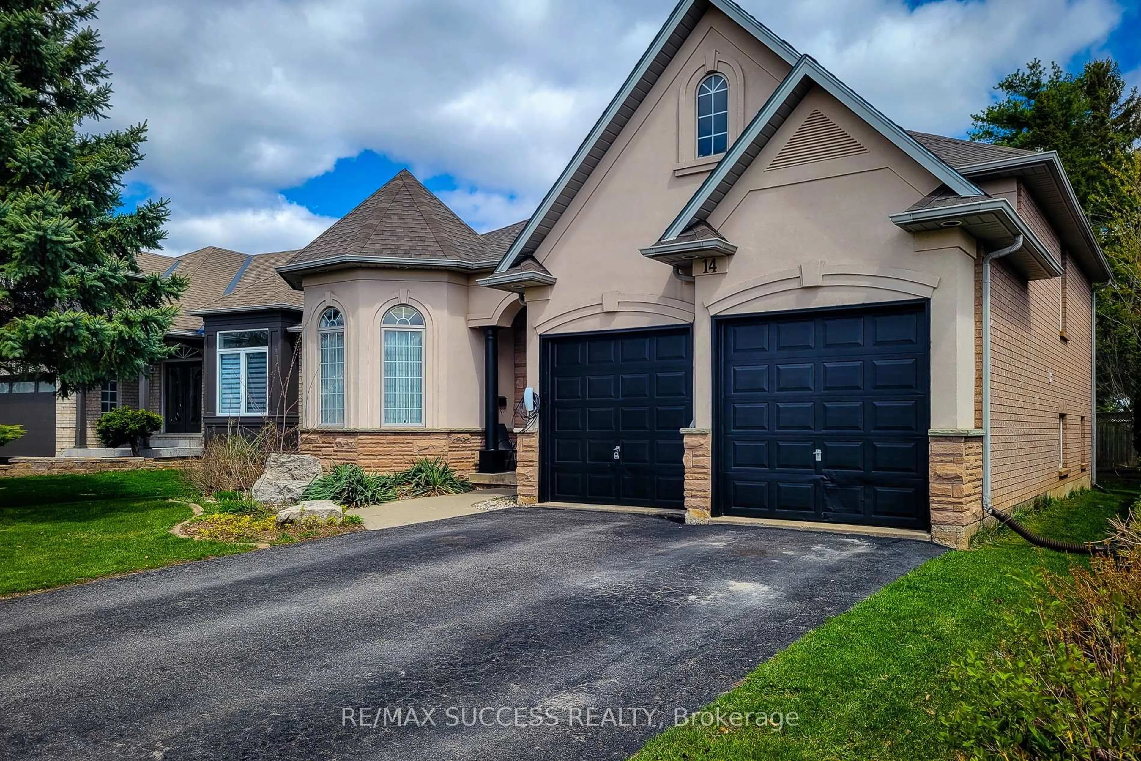 Home with brick exterior material, street for 14 Casson Lane, Brantford Ontario N3R 7Z4