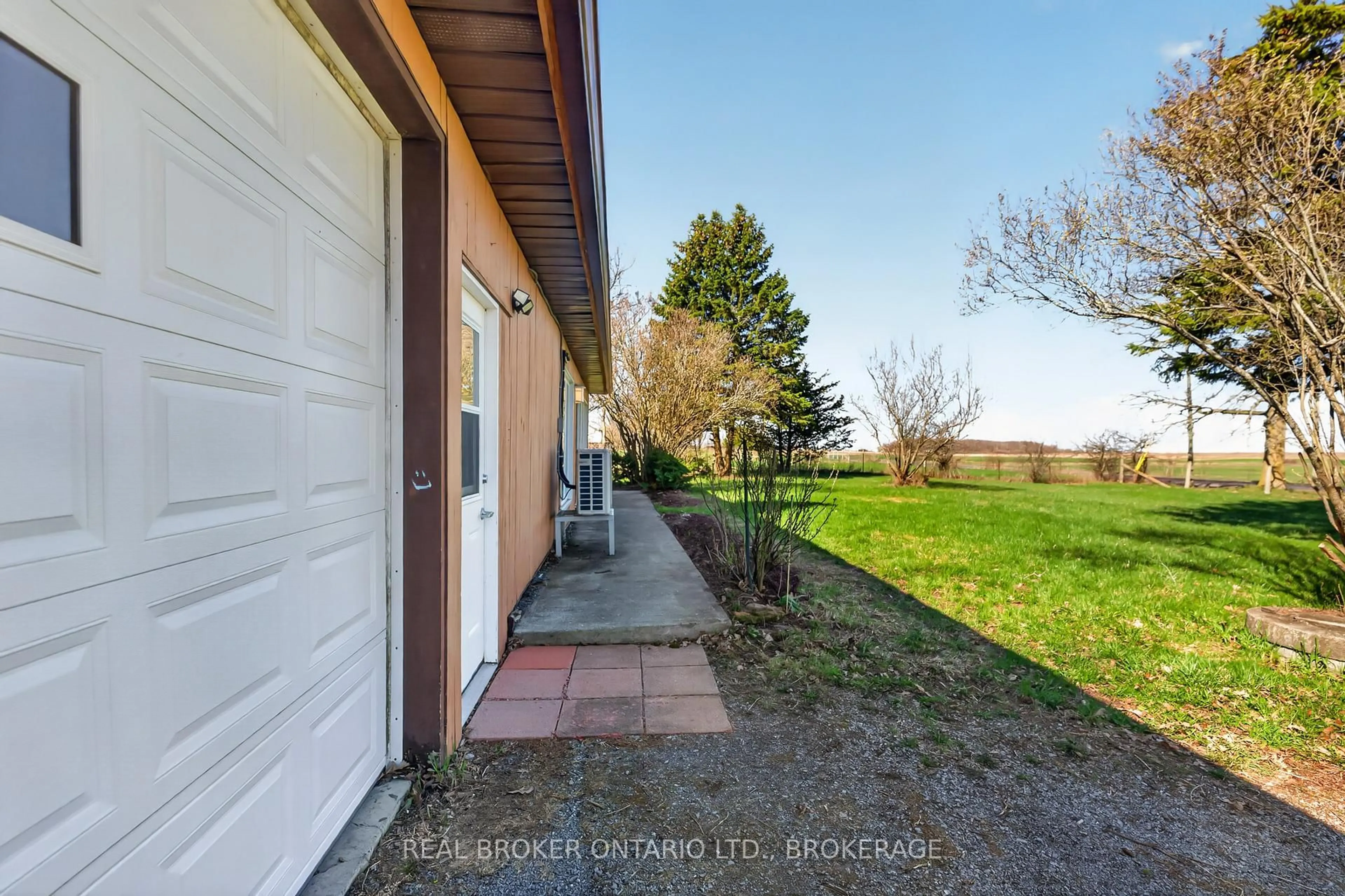 A pic from outside/outdoor area/front of a property/back of a property/a pic from drone, water/lake/river/ocean view for 2268 Mcintyre Rd, Bath Ontario K0H 1G0