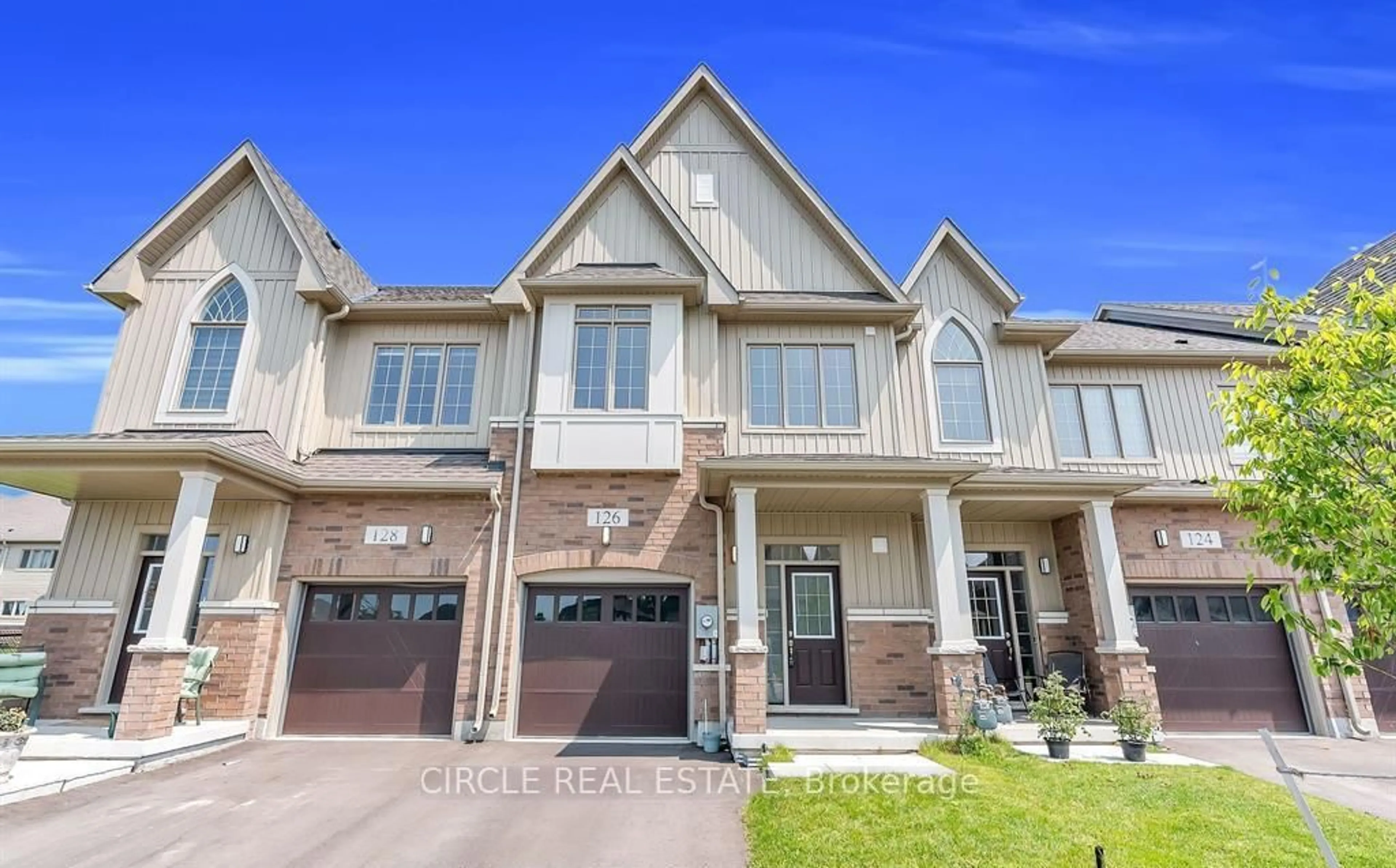 Home with brick exterior material, street for 126 Waters Way, Wellington North Ontario N0G 1A0