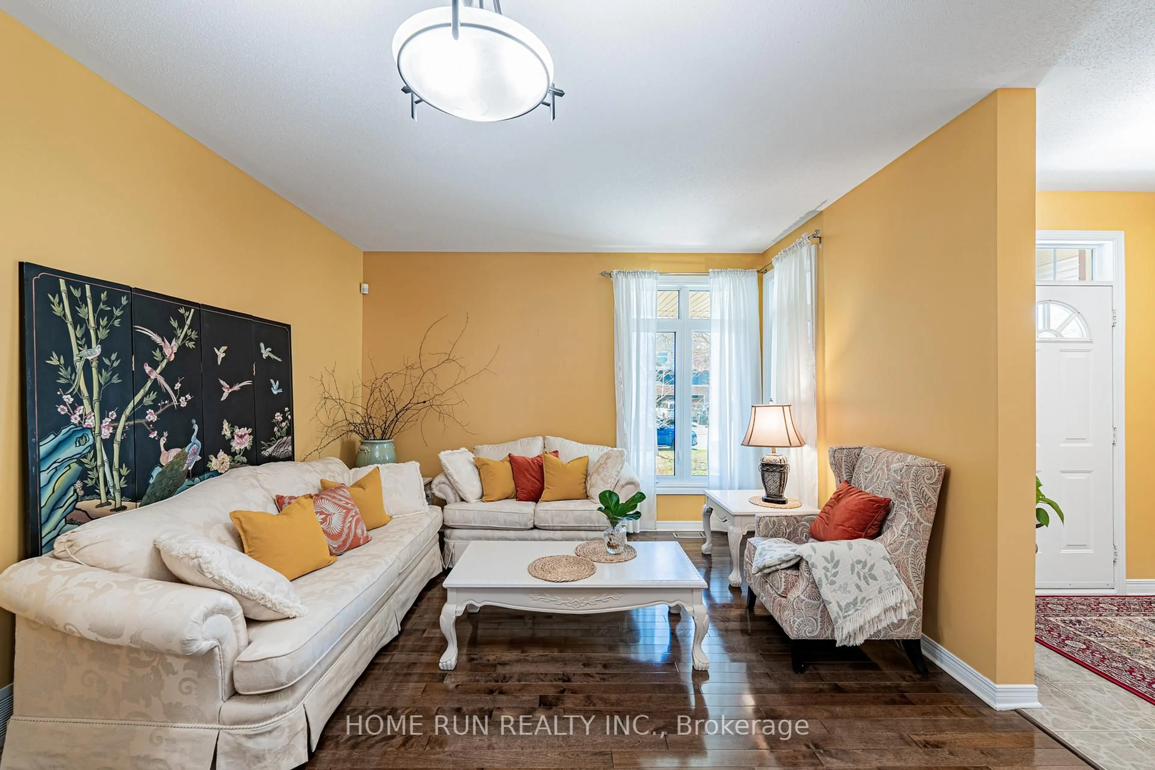 Living room with furniture, wood/laminate floor for 5 Thunderbird Cres, Kanata Ontario K2M 2H4