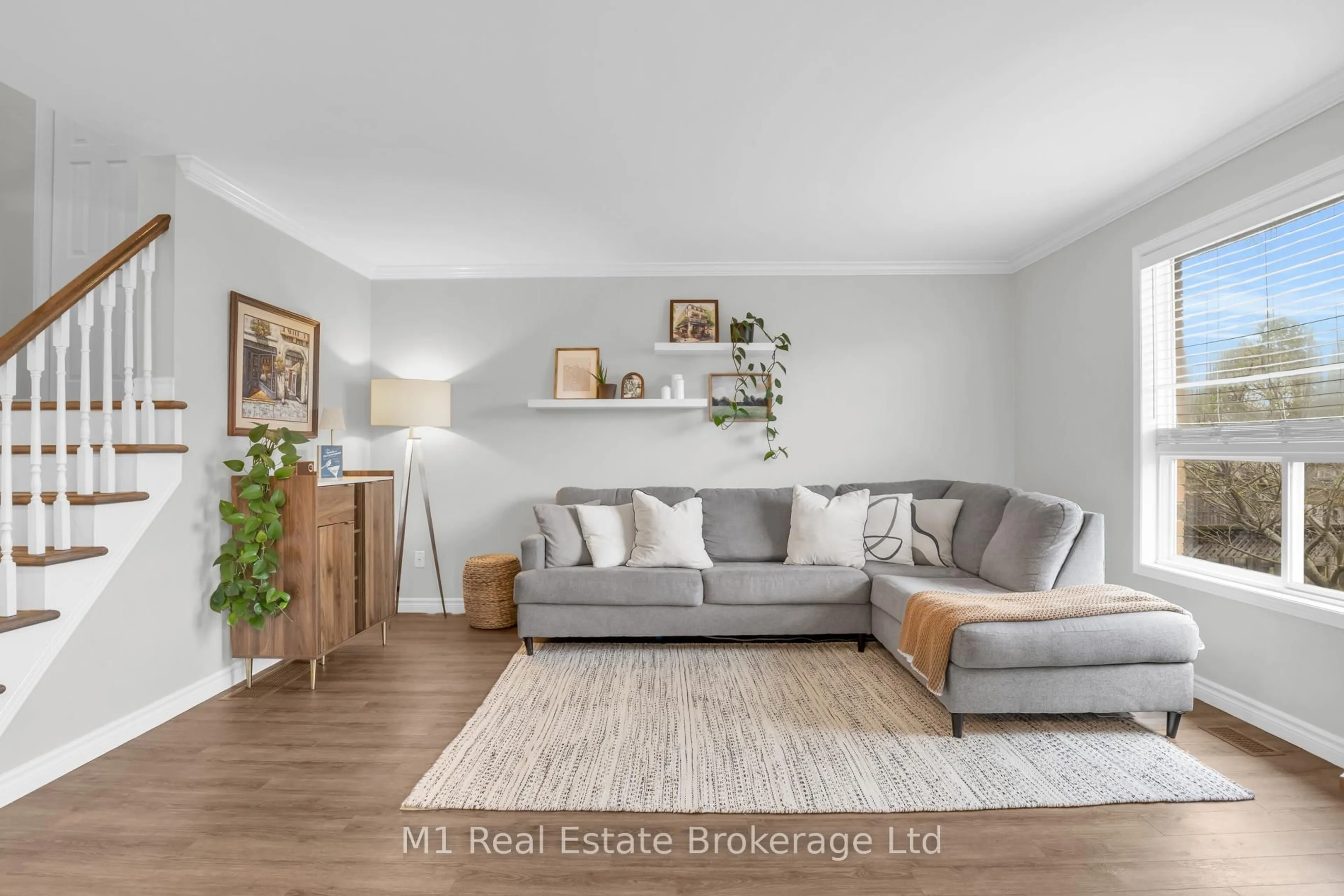 Living room with furniture, wood/laminate floor for 90 Cedarvale Ave, Guelph Ontario N1E 7K2