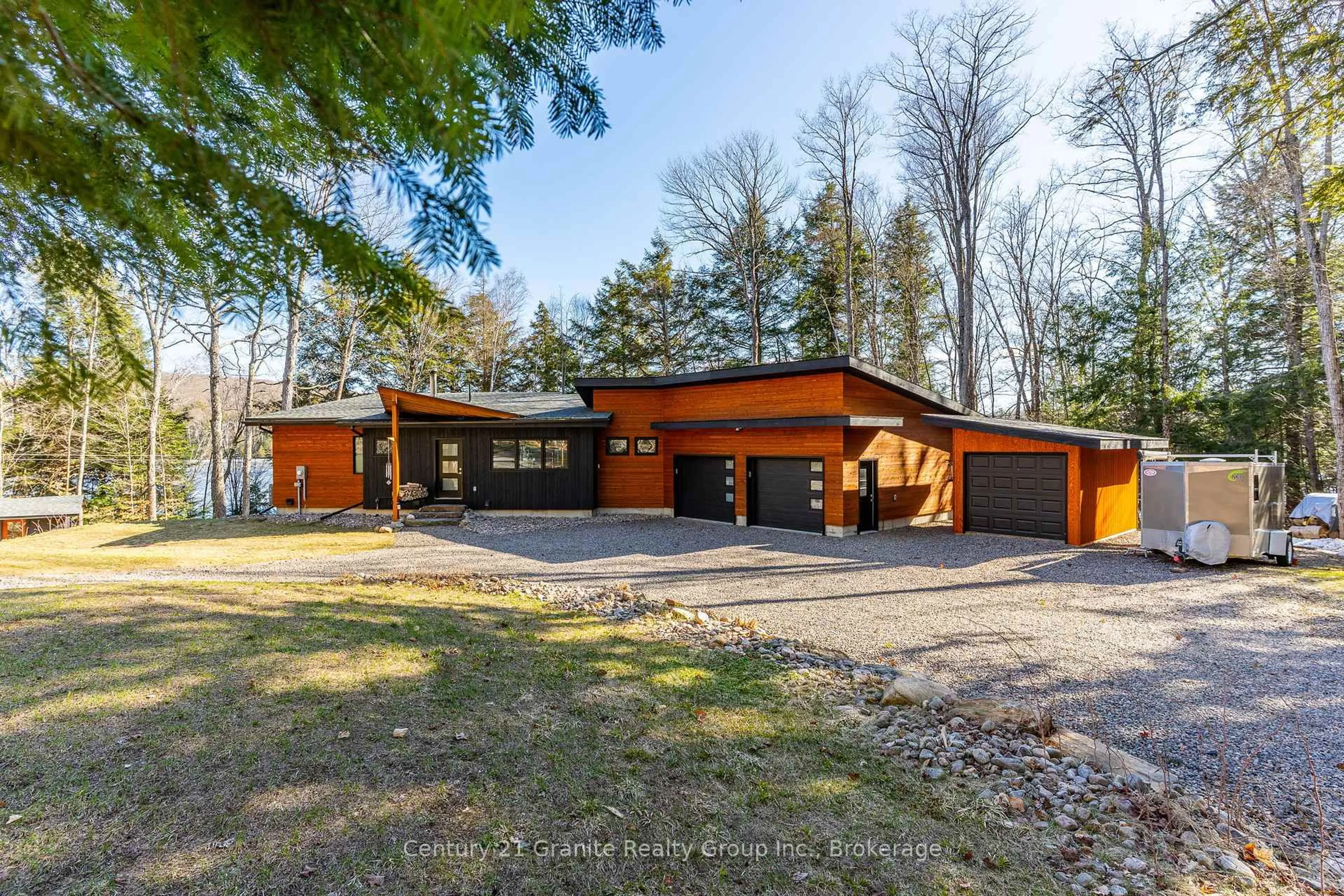 Home with brick exterior material, street for 1133 Sisu Lane, Dysart et al Ontario K0M 1S0