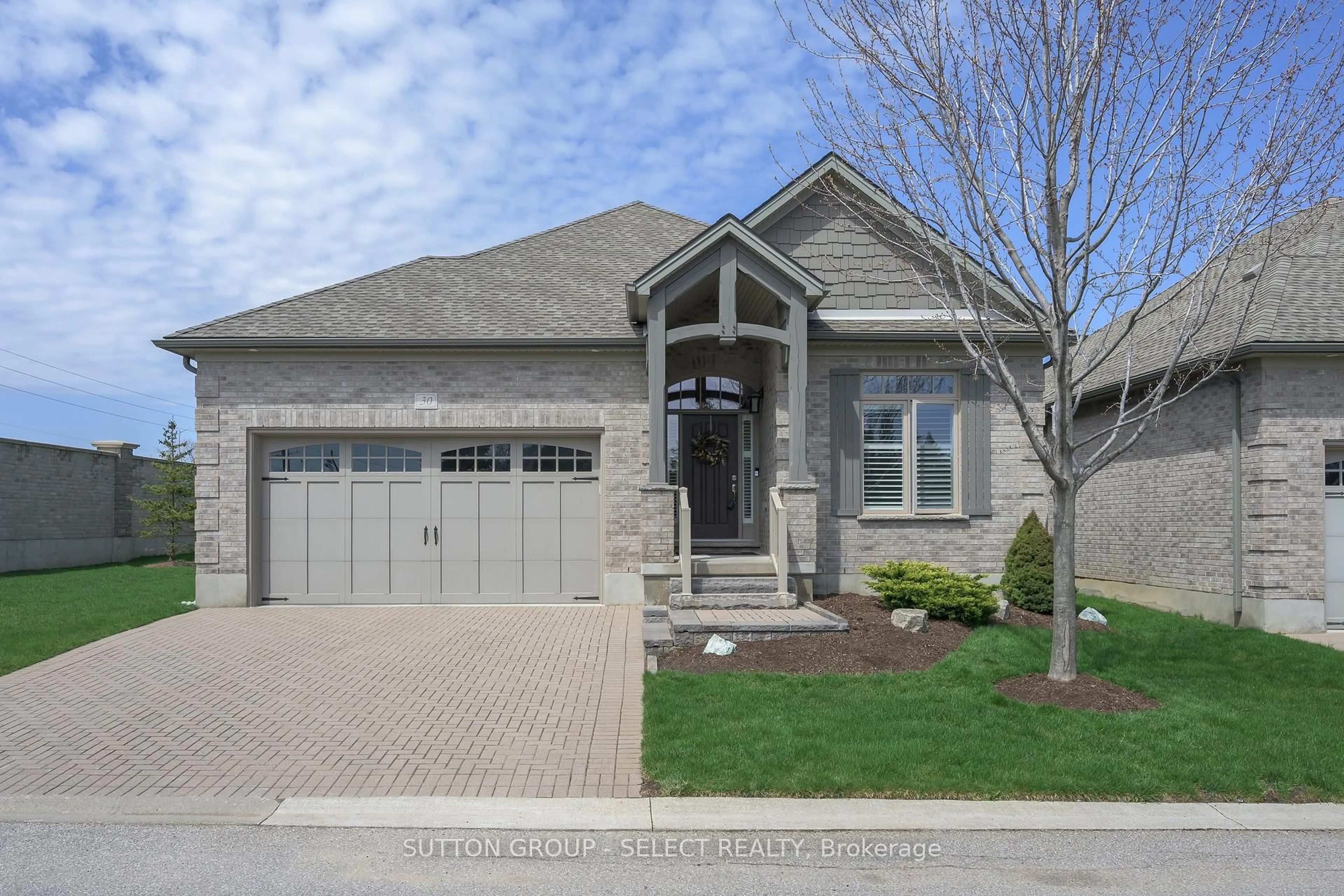 Home with brick exterior material, street for 725 Eagletrace Dr #30, London North Ontario N6G 0J7