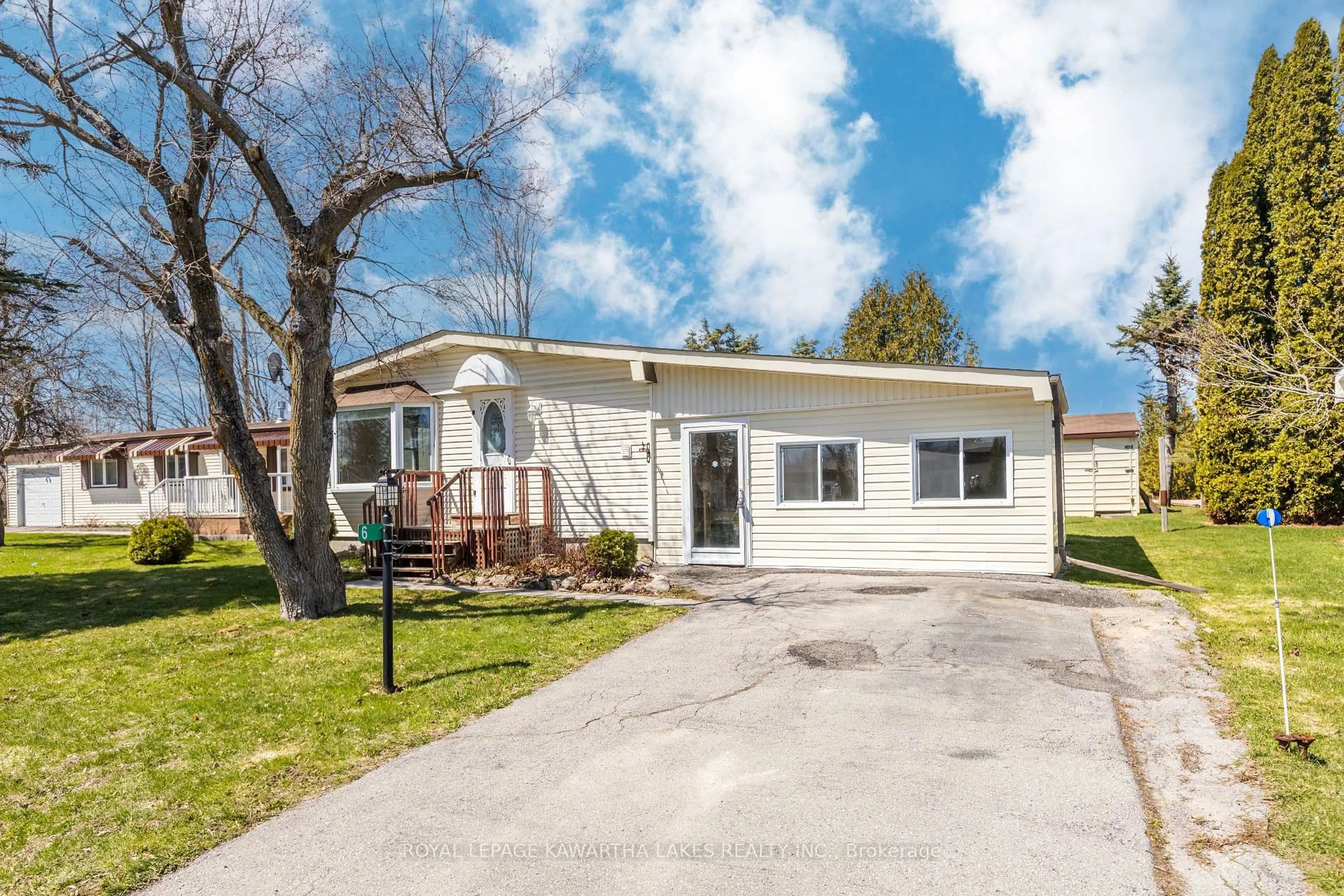 Home with vinyl exterior material, street for 6 Circle Dr, Kawartha Lakes Ontario K9V 0H7