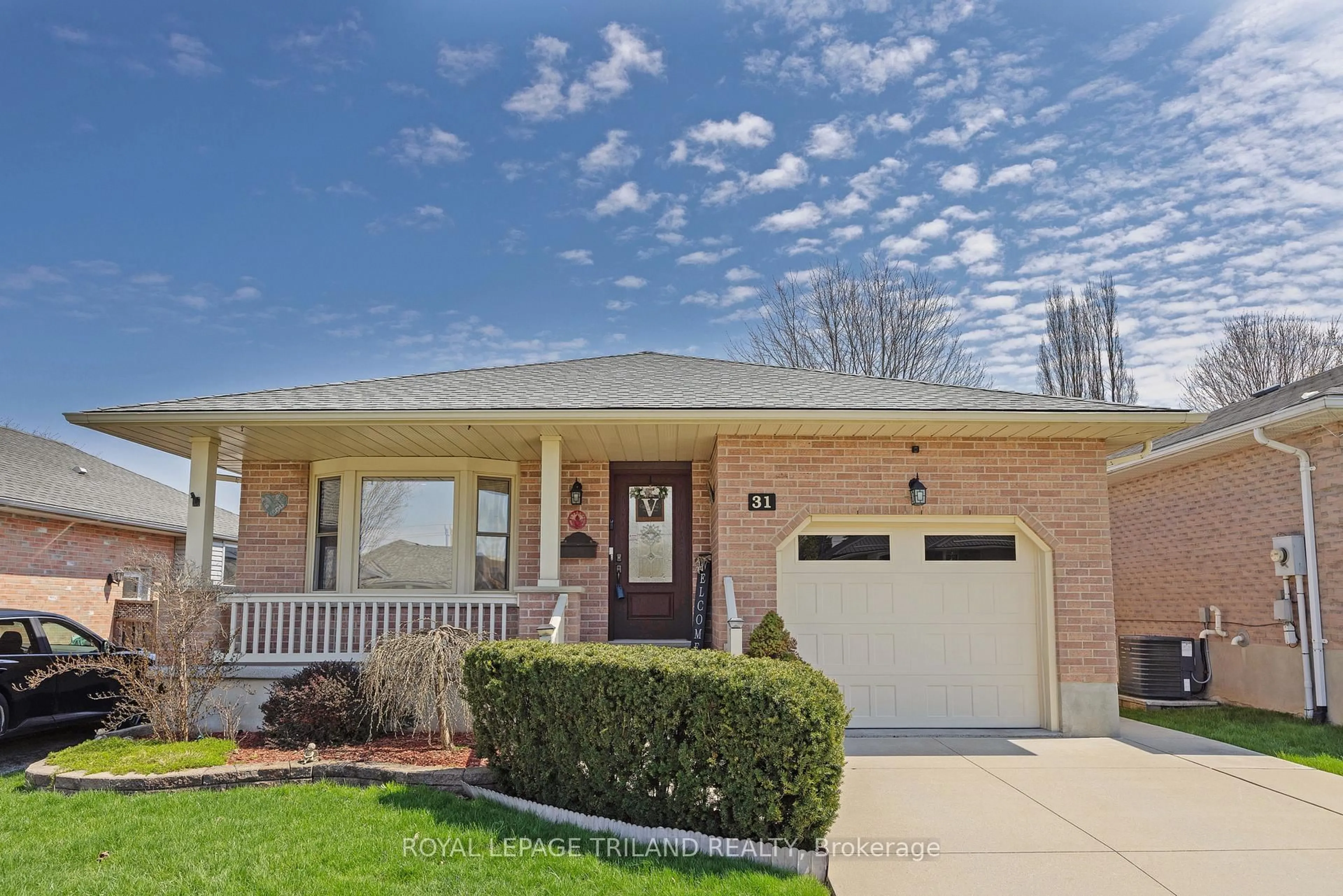 Home with brick exterior material, street for 31 Neal Ave, St. Thomas Ontario N5R 6B5