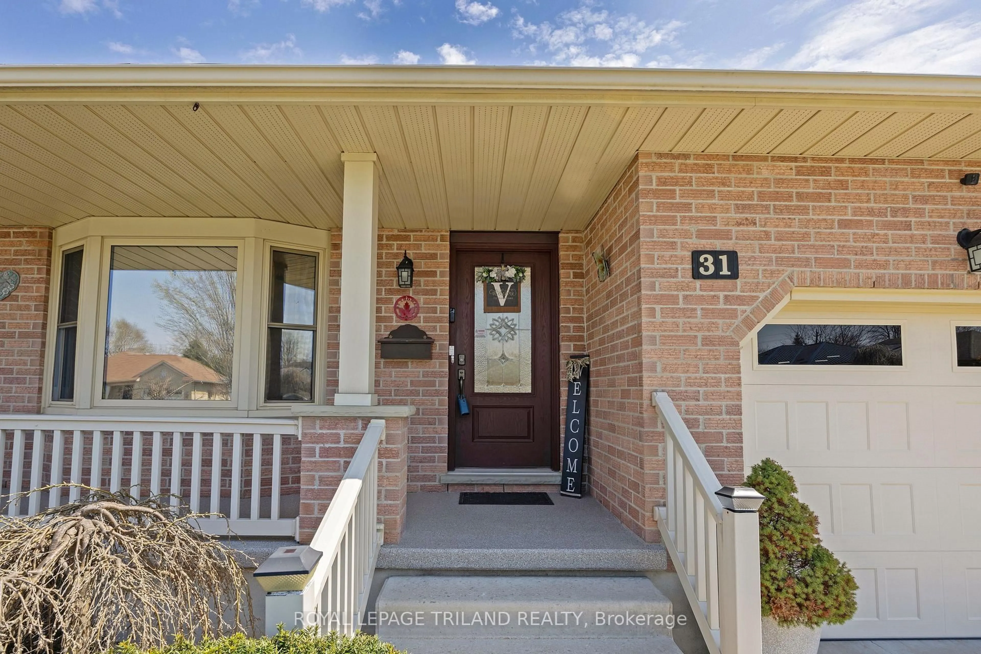 Home with brick exterior material, street for 31 Neal Ave, St. Thomas Ontario N5R 6B5
