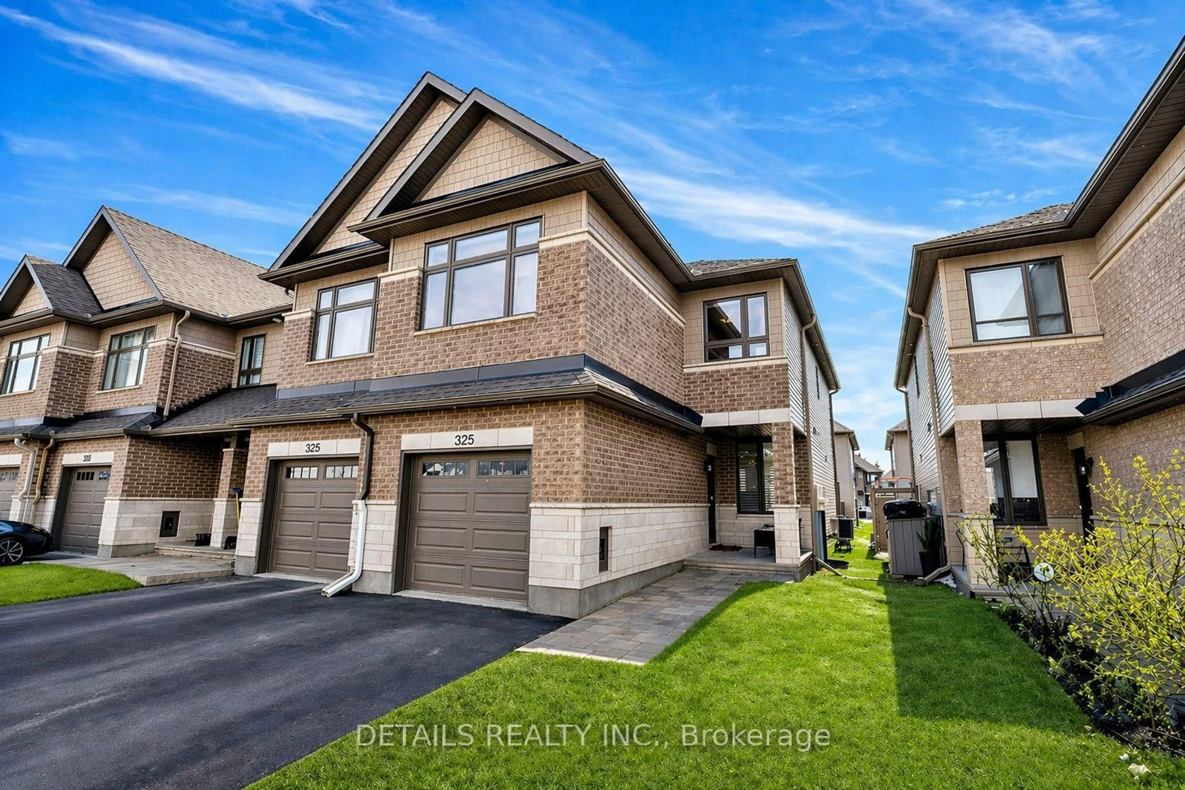 Home with brick exterior material, street for 325 Proud Walk, Stittsville Ontario K2S 2L6