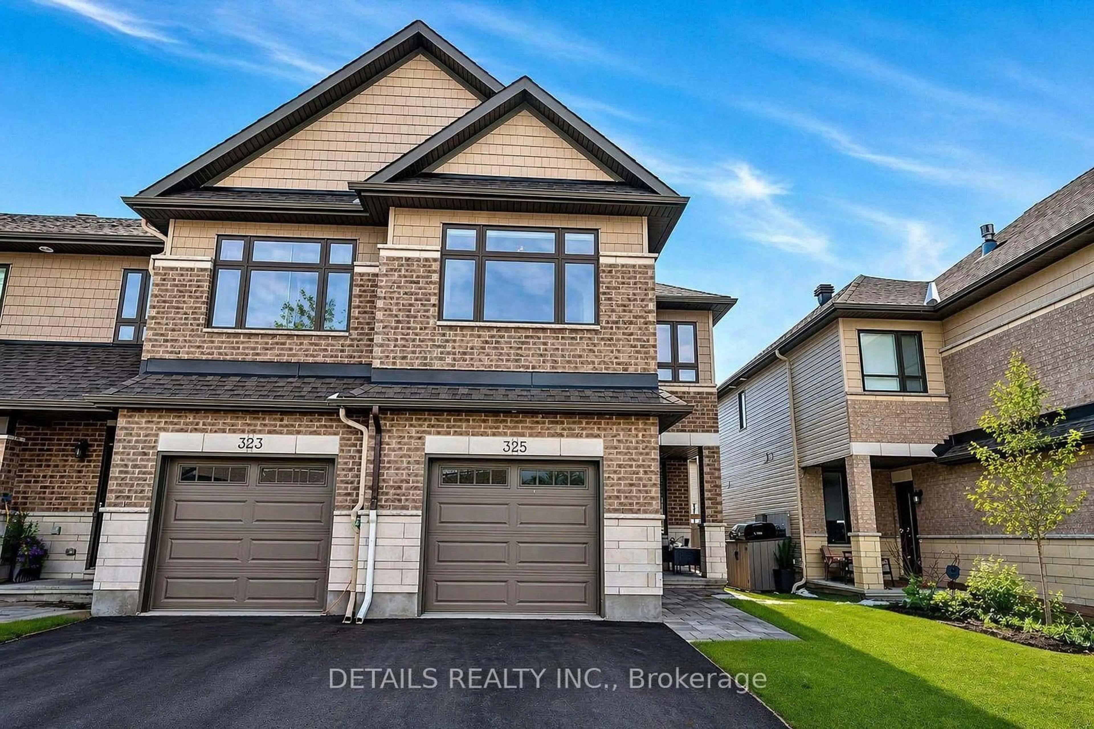 Home with brick exterior material, street for 325 Proud Walk, Stittsville Ontario K2S 2L6