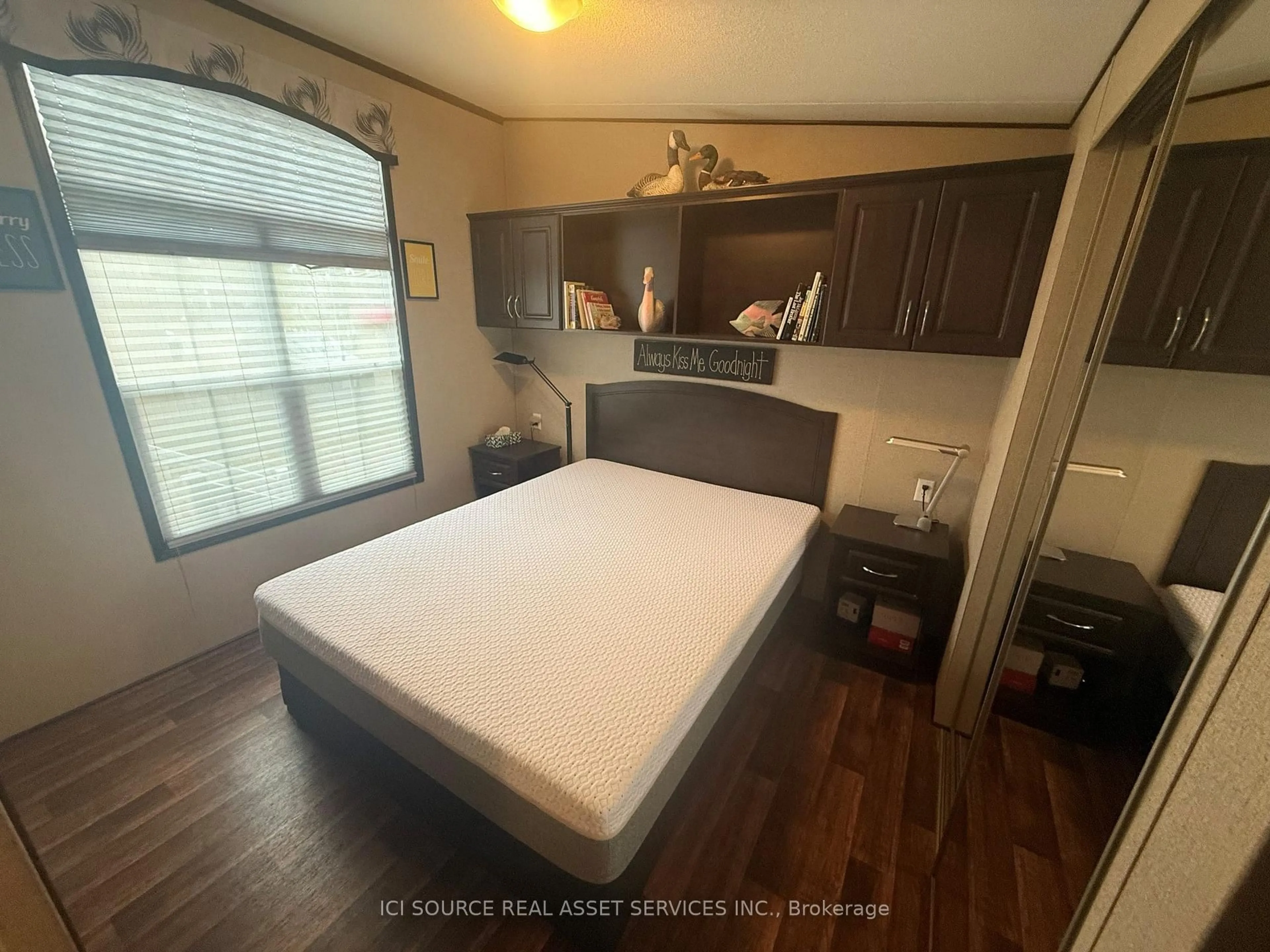 Bedroom with bed, wood/laminate floor for 486 County Road 18 #CBL80, Prince Edward County Ontario K0K 1P0