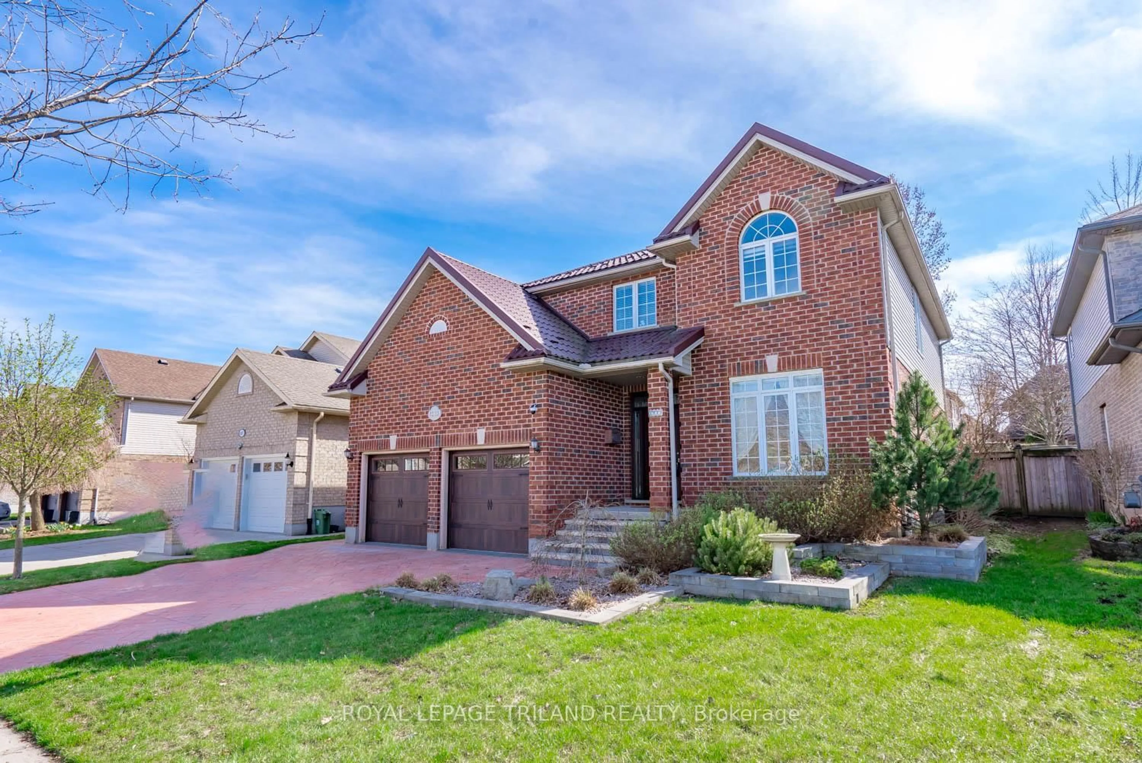 Home with brick exterior material, street for 1223 Thornley St, London South Ontario N6K 4V3