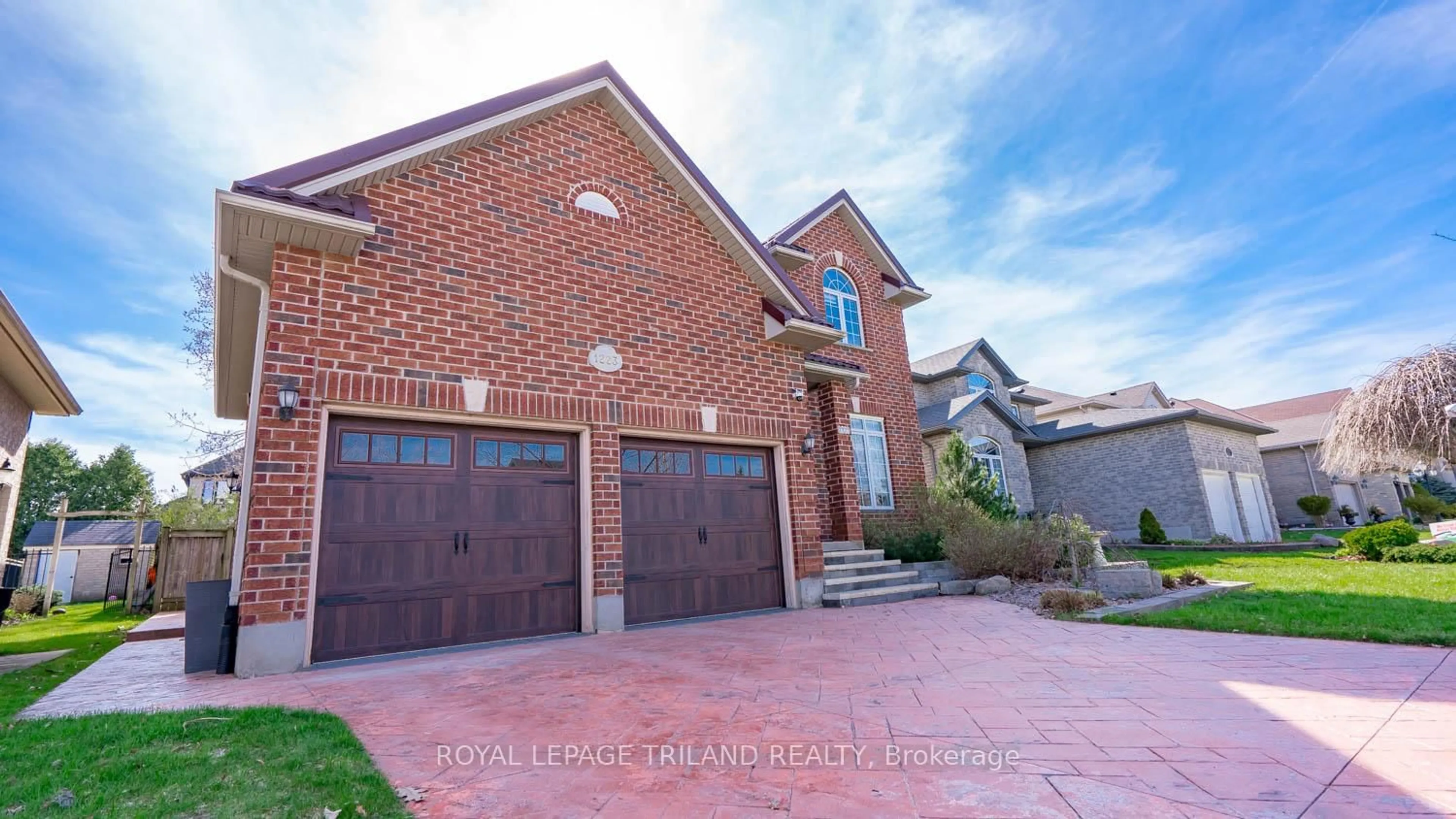Home with brick exterior material, street for 1223 Thornley St, London South Ontario N6K 4V3