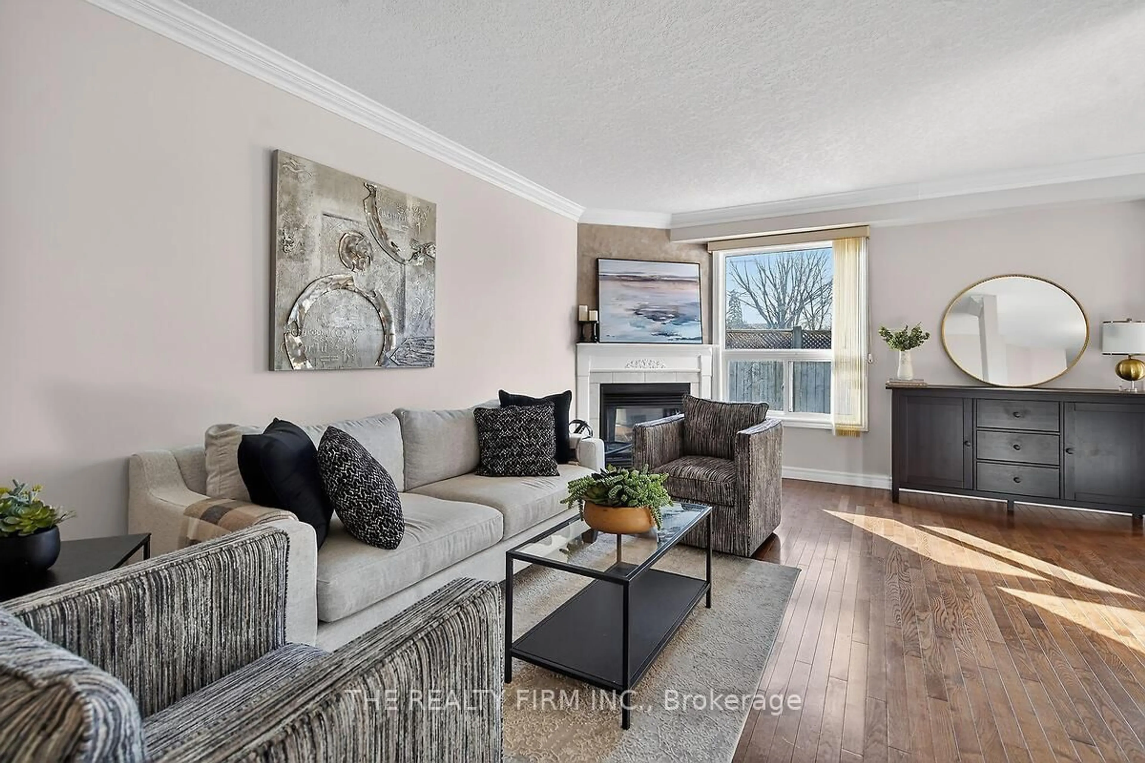 Living room with furniture, wood/laminate floor for 767 Wharncliffe Rd #23, London South Ontario N6J 2N7