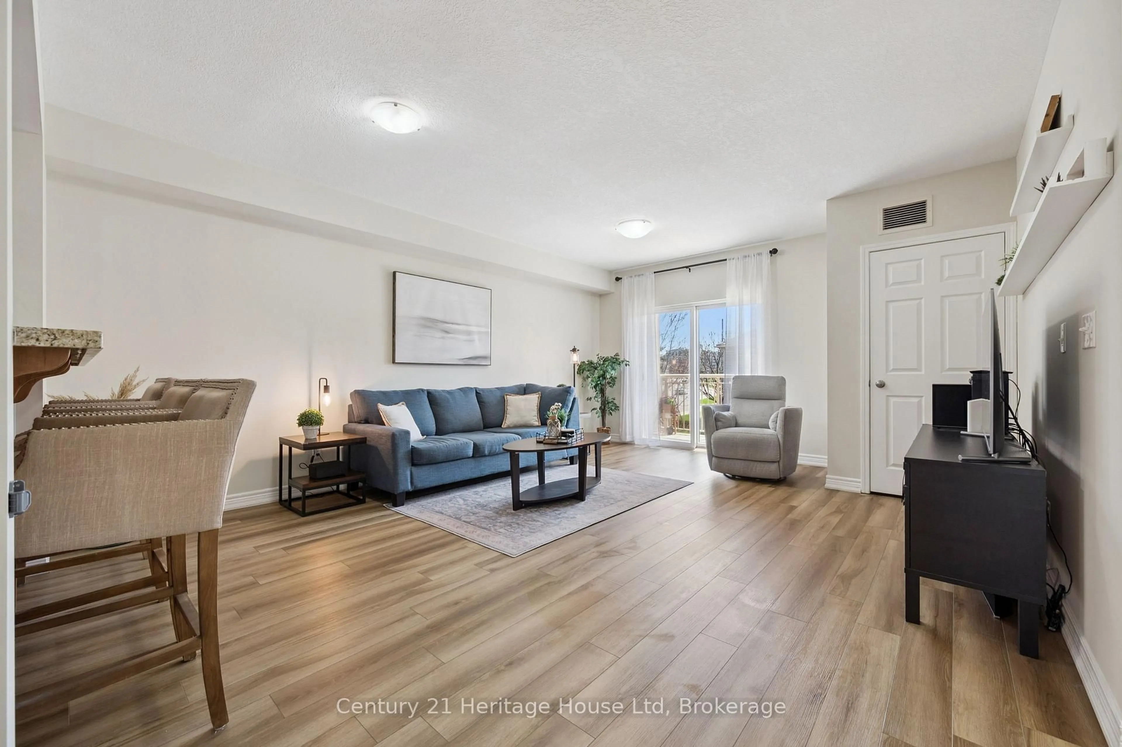 Living room with furniture, unknown for 901 Paisley Rd #207, Guelph Ontario N1K 0A7