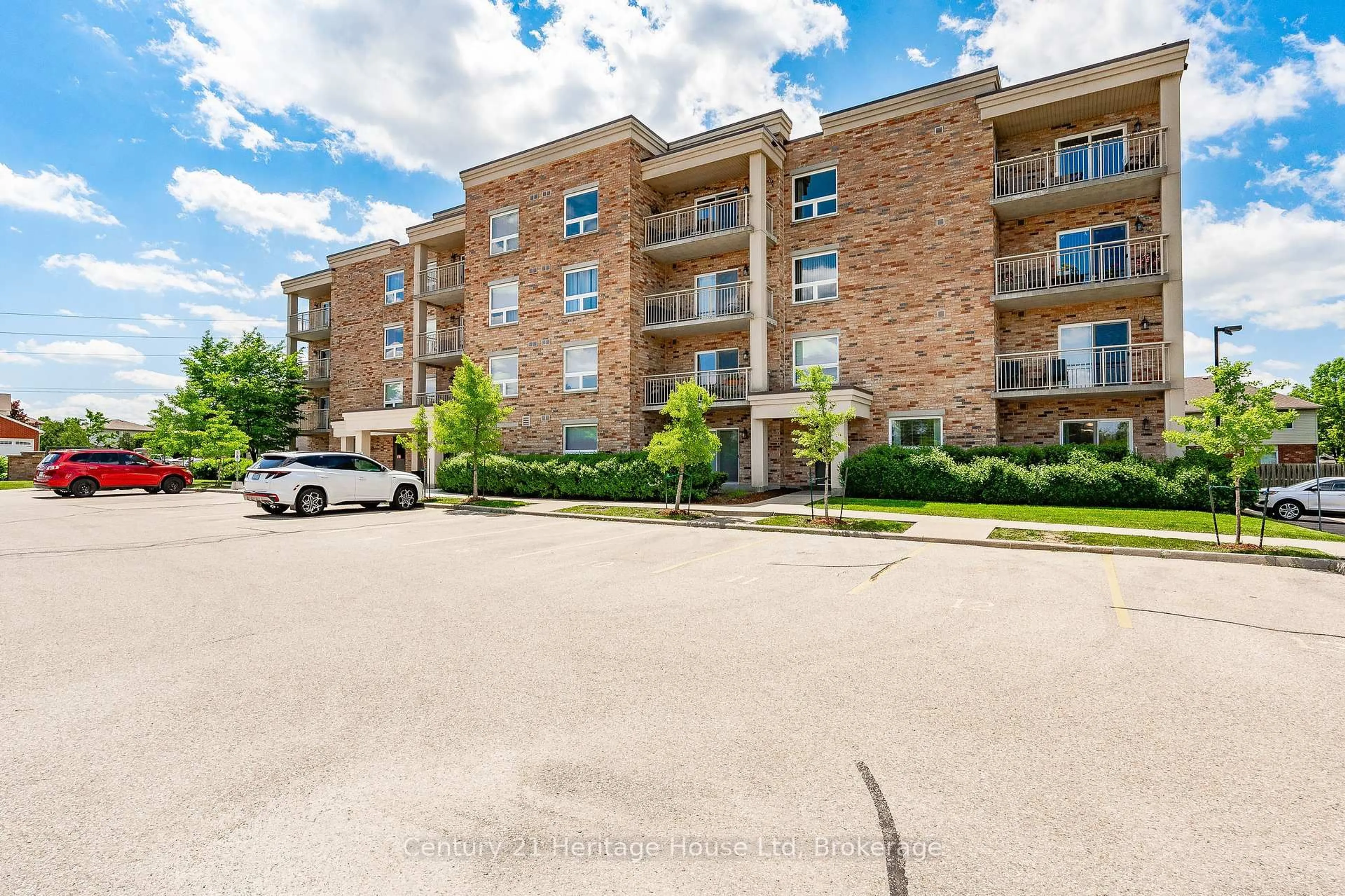 A pic from outside/outdoor area/front of a property/back of a property/a pic from drone, unknown for 901 Paisley Rd #207, Guelph Ontario N1K 0A7