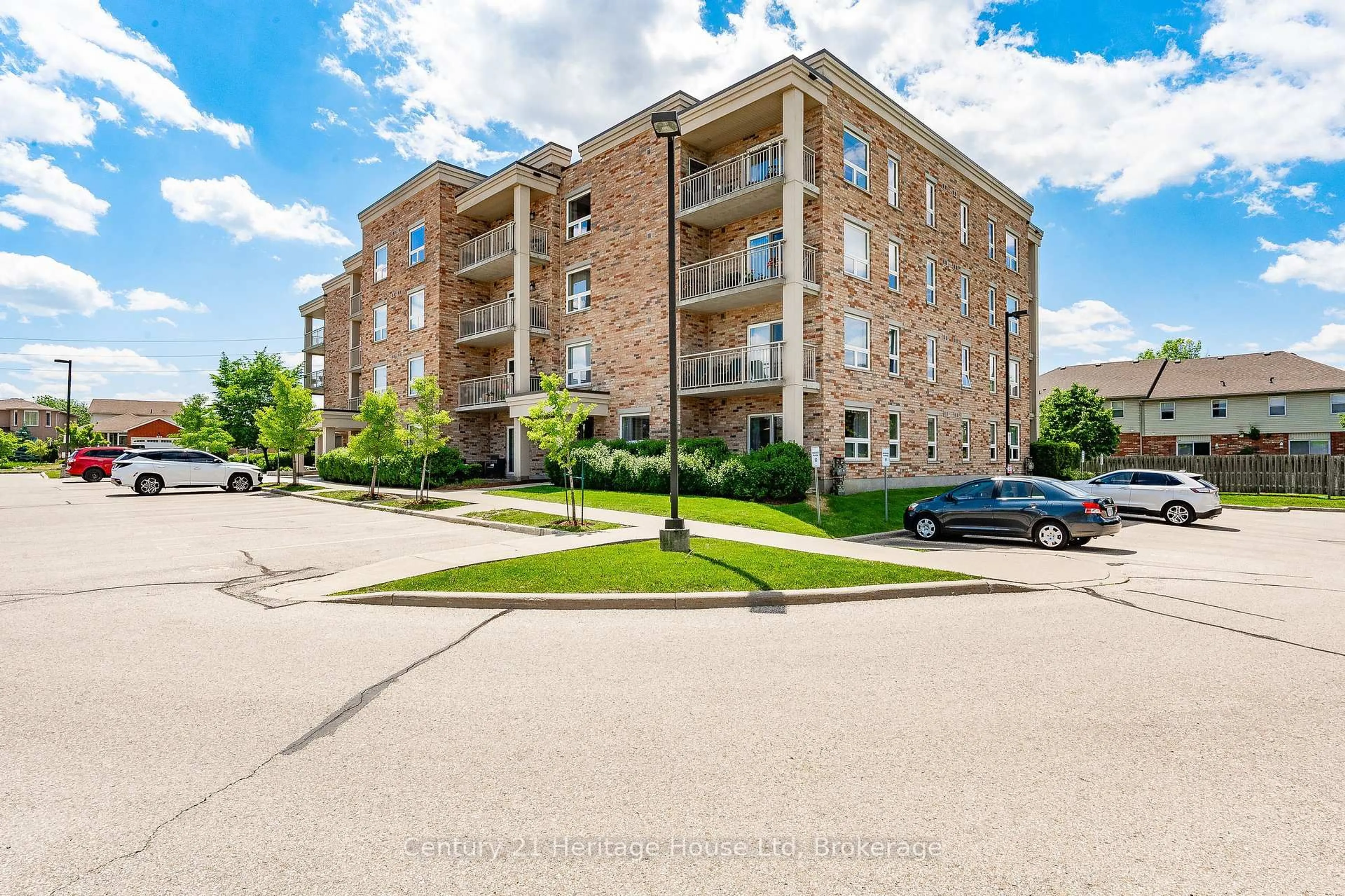 A pic from outside/outdoor area/front of a property/back of a property/a pic from drone, building for 901 Paisley Rd #207, Guelph Ontario N1K 0A7