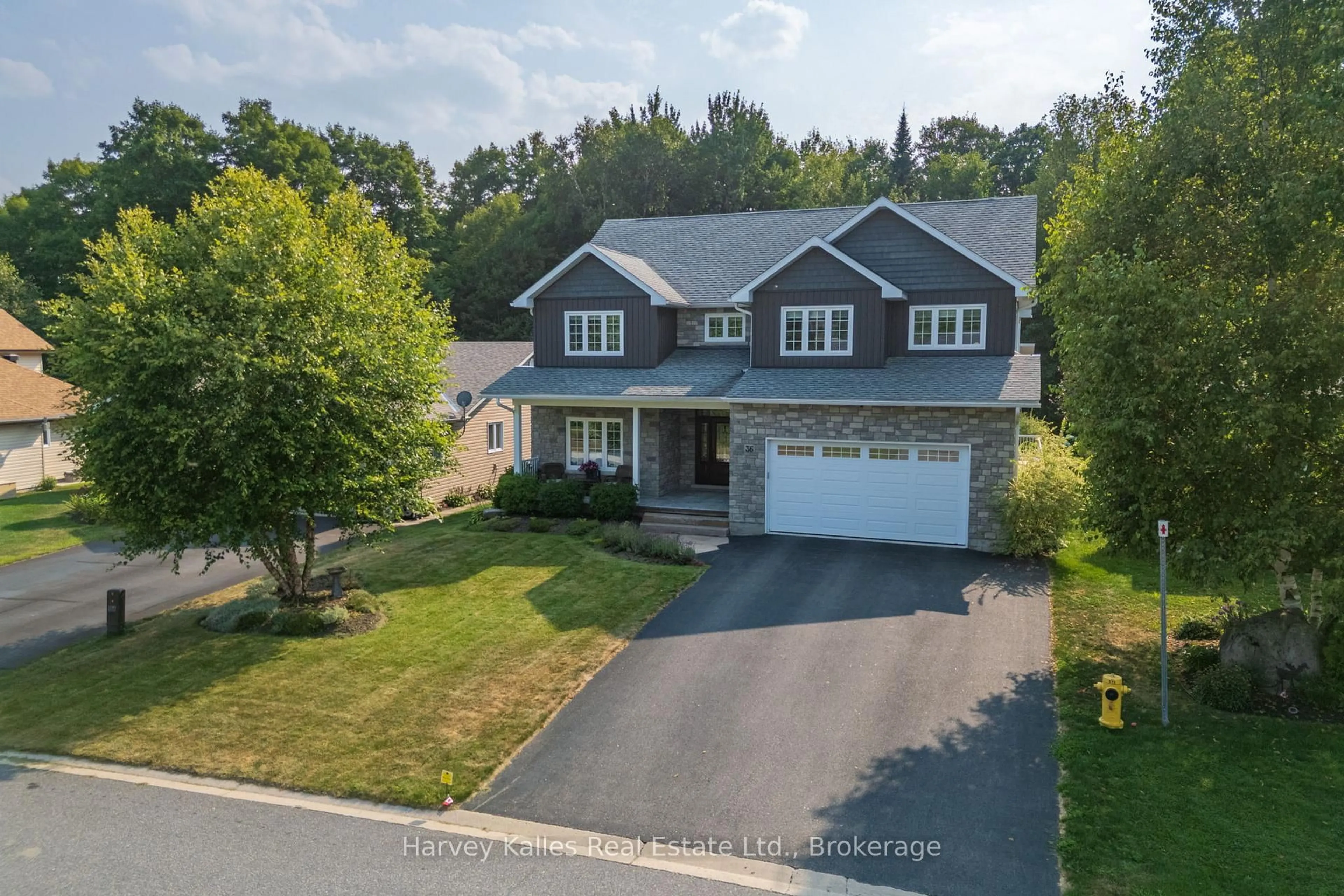 A pic from outside/outdoor area/front of a property/back of a property/a pic from drone, street for 36 Homestead Lane, Huntsville Ontario P1H 2N8