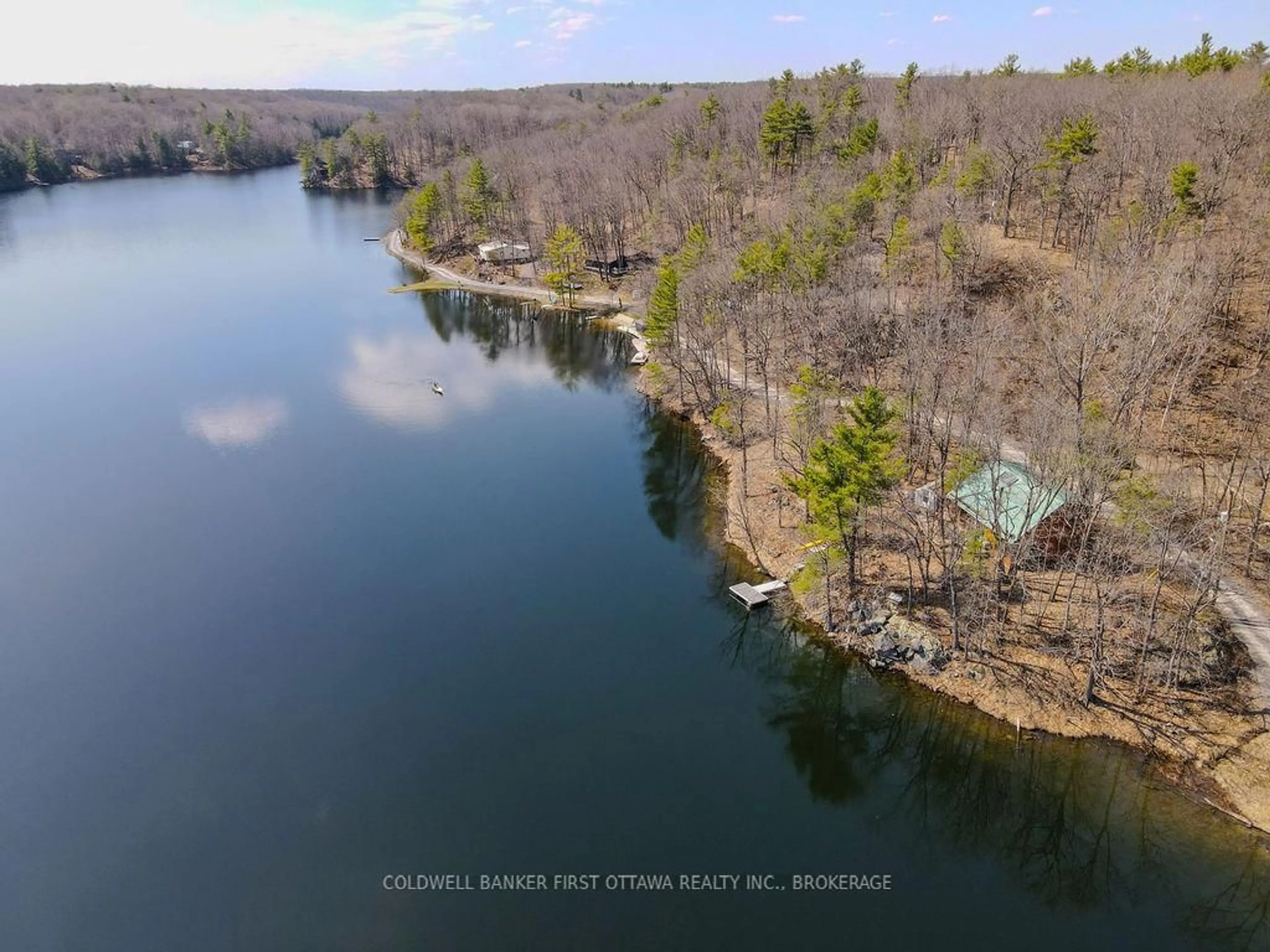 A pic from outside/outdoor area/front of a property/back of a property/a pic from drone, water/lake/river/ocean view for 2238 Little Long Lake Rd, Sydenham Ontario K0H 2T0
