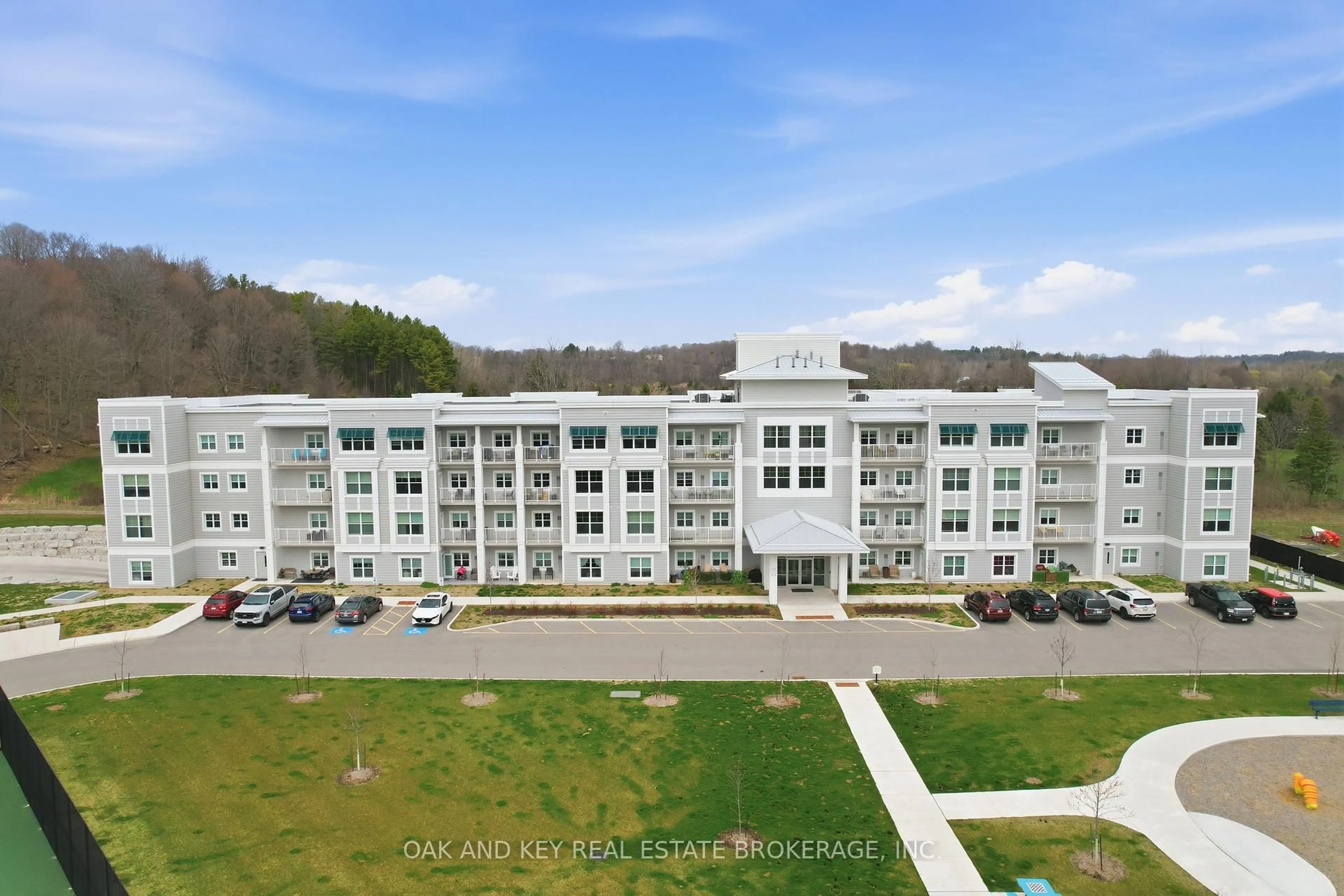 A pic from outside/outdoor area/front of a property/back of a property/a pic from drone, building for 100 The Prom #203, Central Elgin Ontario N5L 1C9