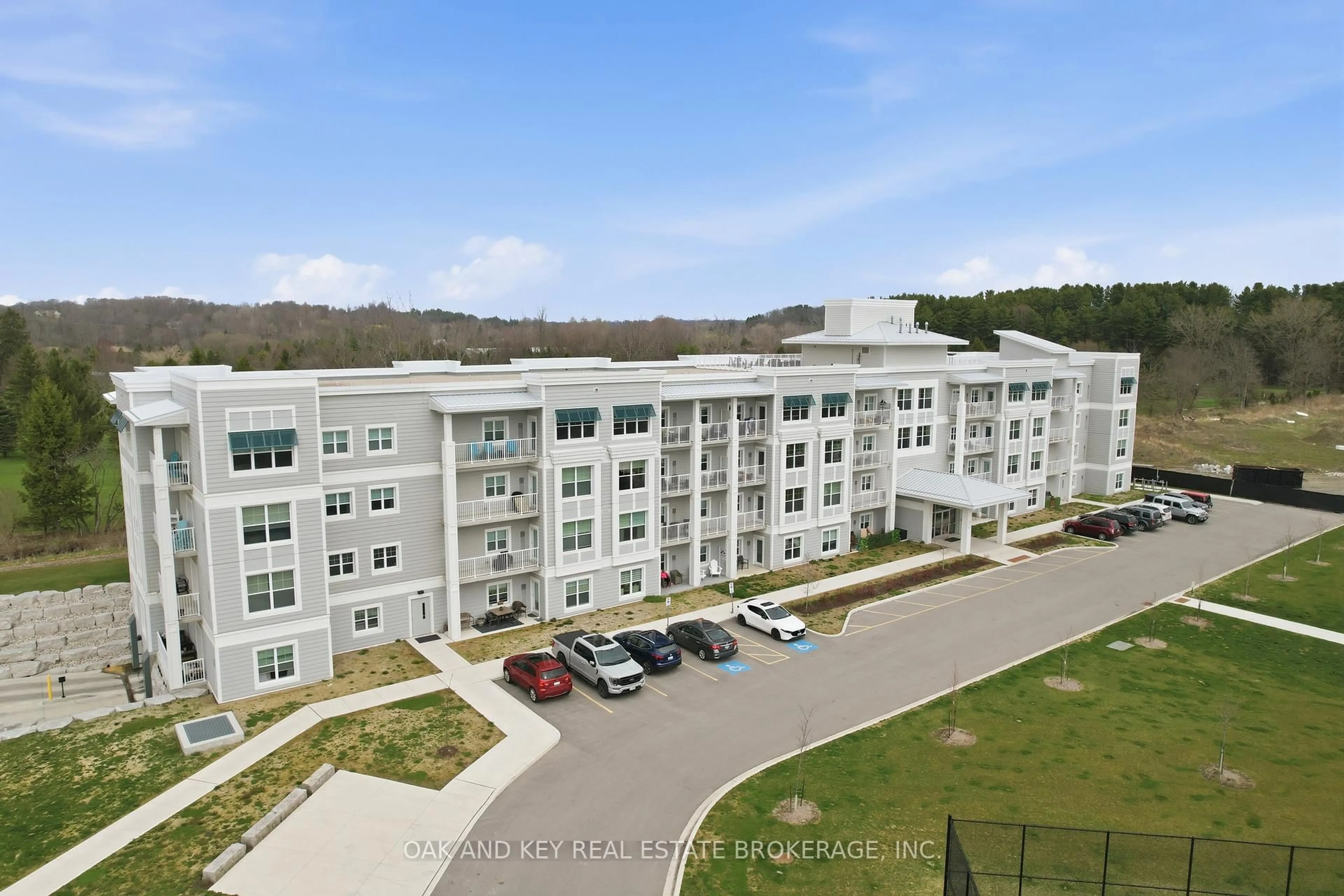 A pic from outside/outdoor area/front of a property/back of a property/a pic from drone, unknown for 100 The Prom #203, Central Elgin Ontario N5L 1C9