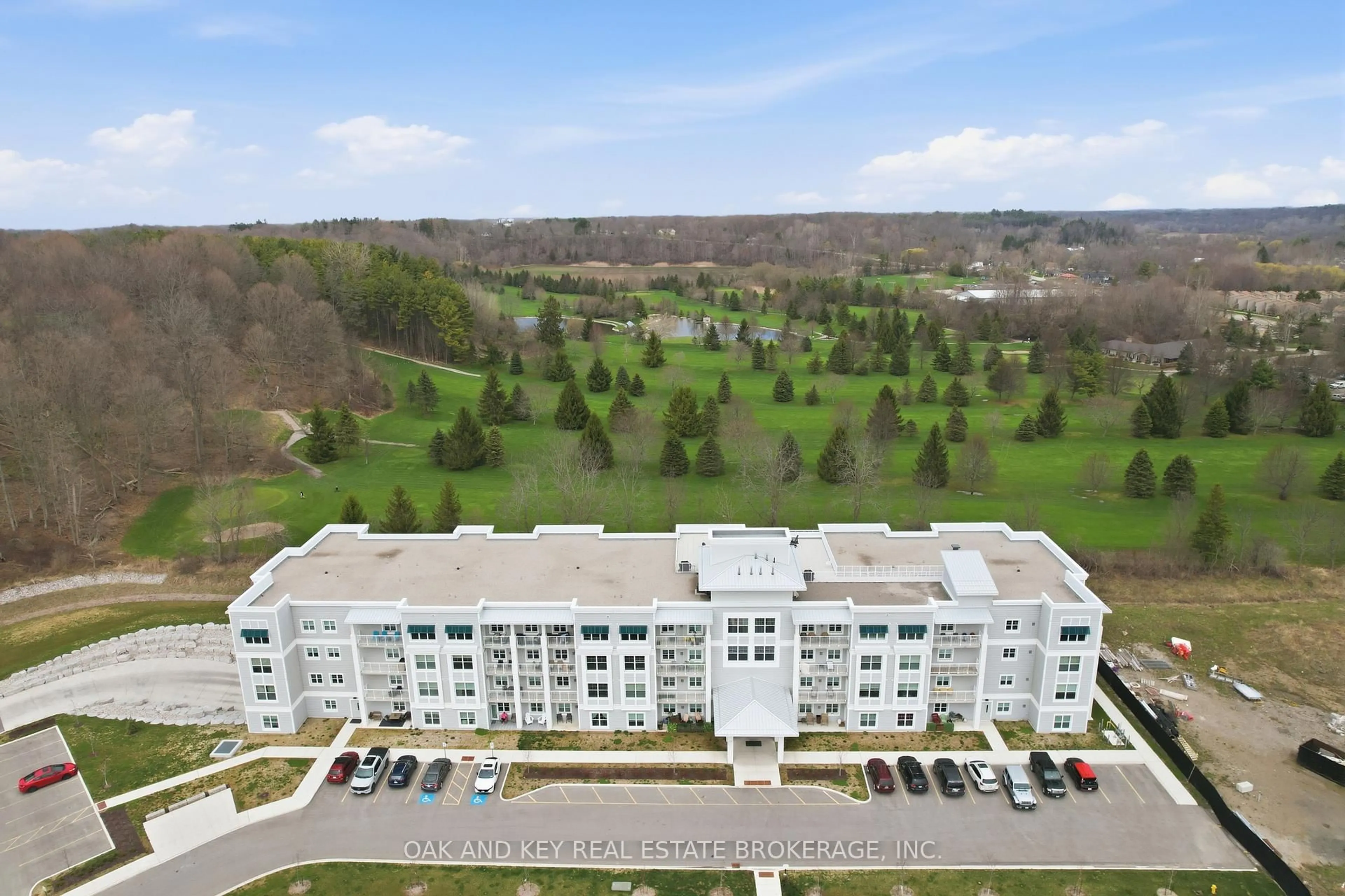 A pic from outside/outdoor area/front of a property/back of a property/a pic from drone, building for 100 The Prom #203, Central Elgin Ontario N5L 1C9