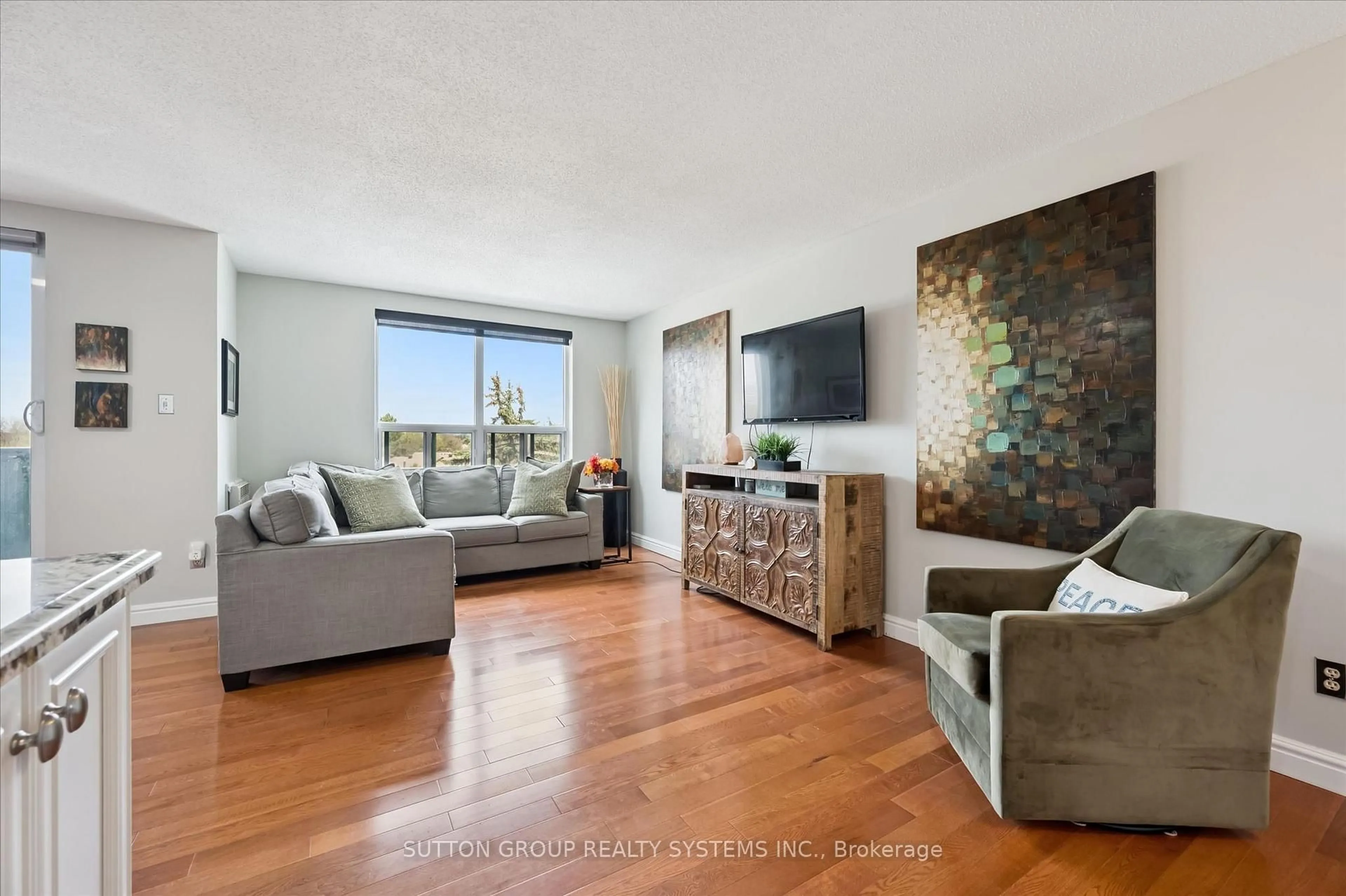 Living room with furniture, unknown for 421 Fairview Dr #406, Brantford Ontario N3R 7M3