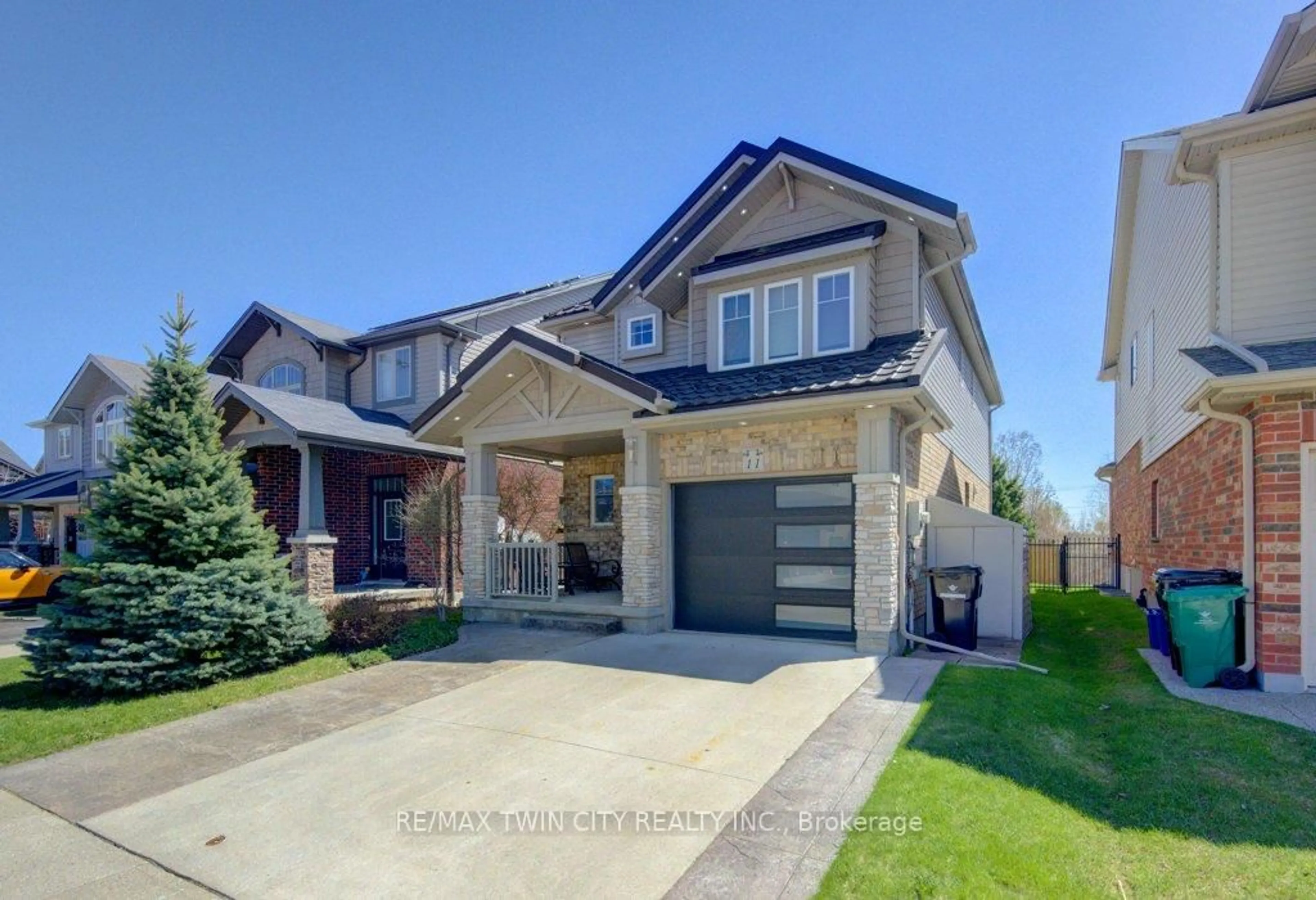 Home with brick exterior material, street for 11 Frey Cres, Kitchener Ontario N2E 4L5