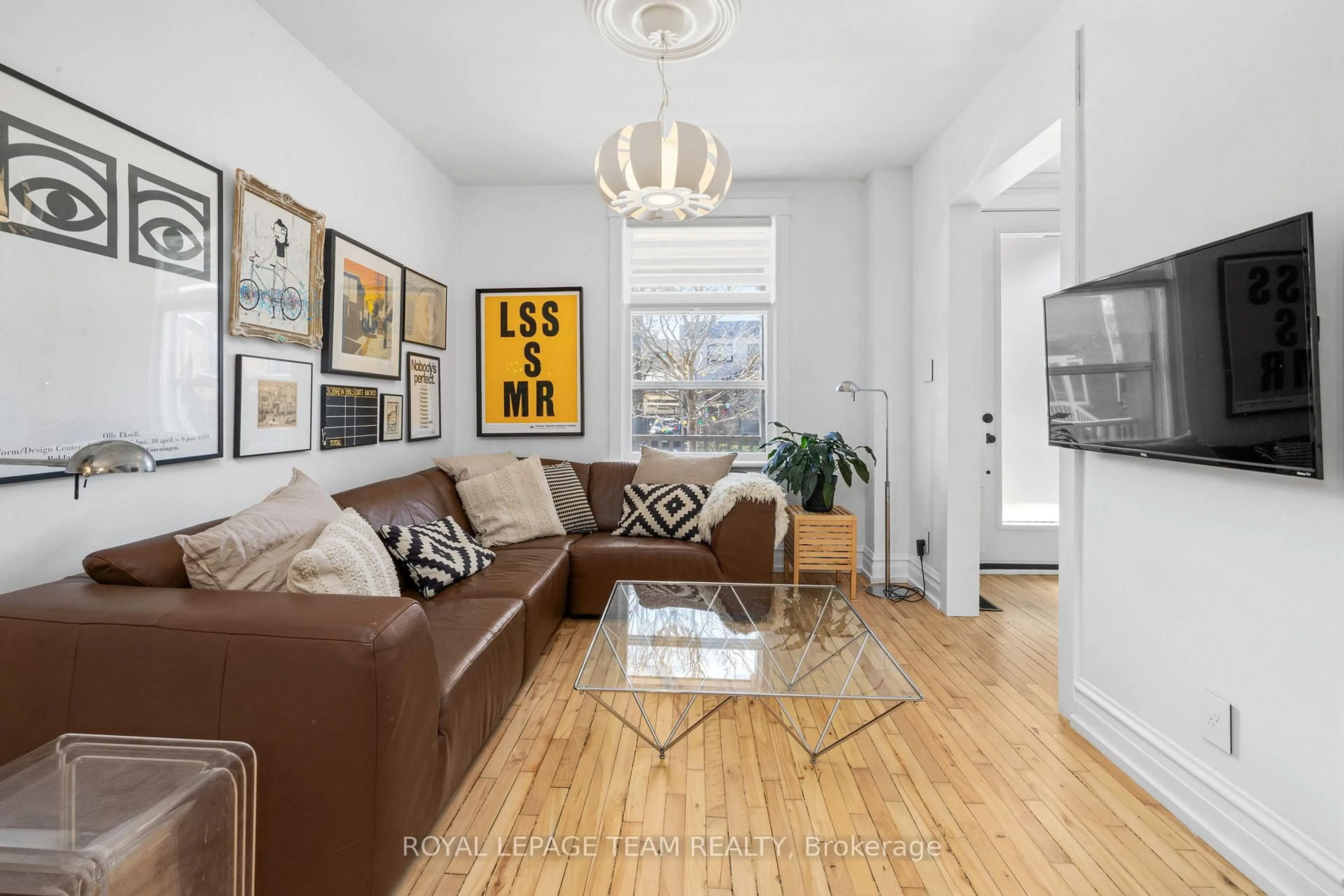 Living room with furniture, unknown for 45 Springfield Rd, Ottawa Ontario K1M 1C8