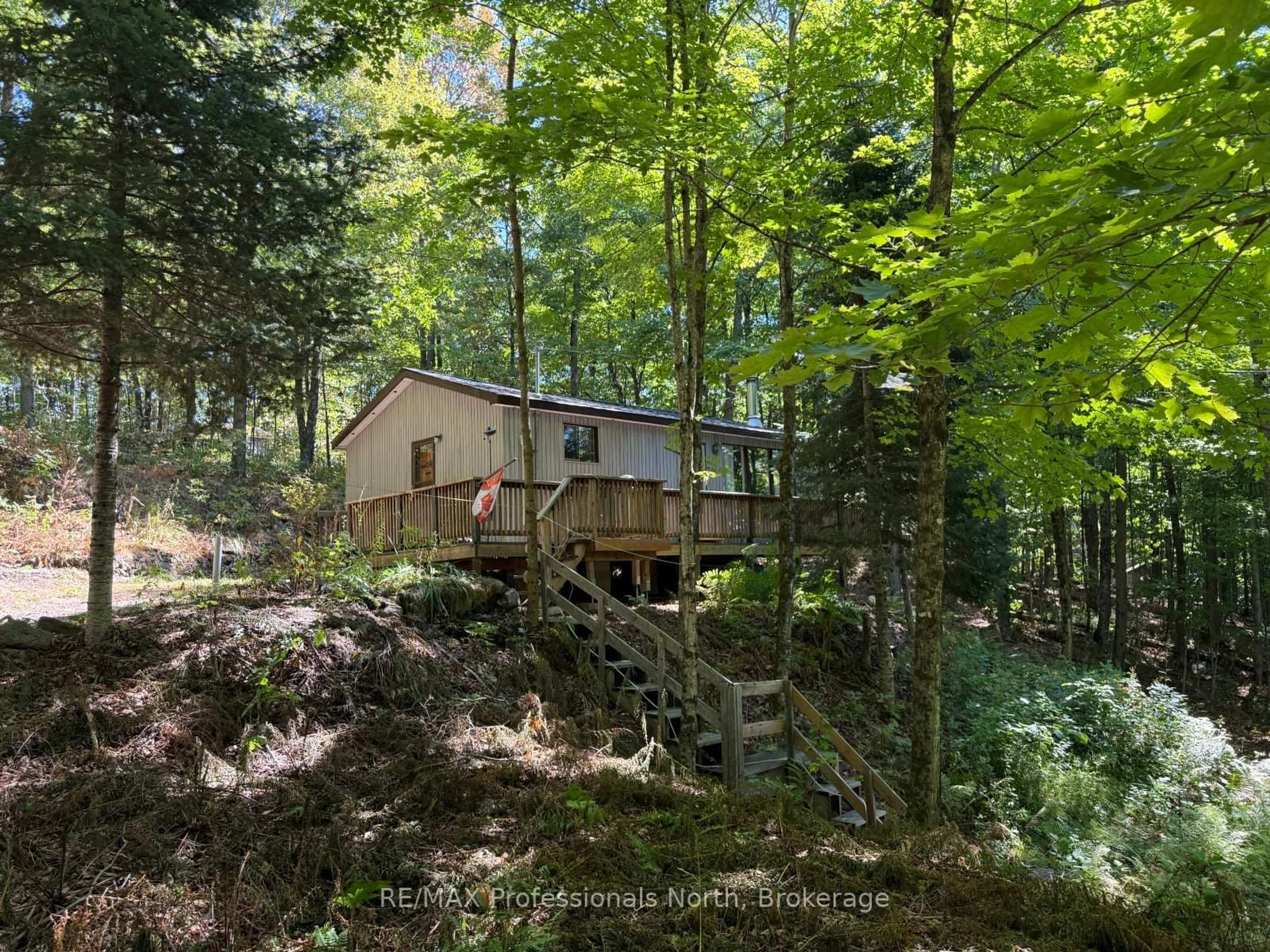 A pic from outside/outdoor area/front of a property/back of a property/a pic from drone, forest/trees view for 1025 Manitou Rd, Dysart et al Ontario K0M 1S0