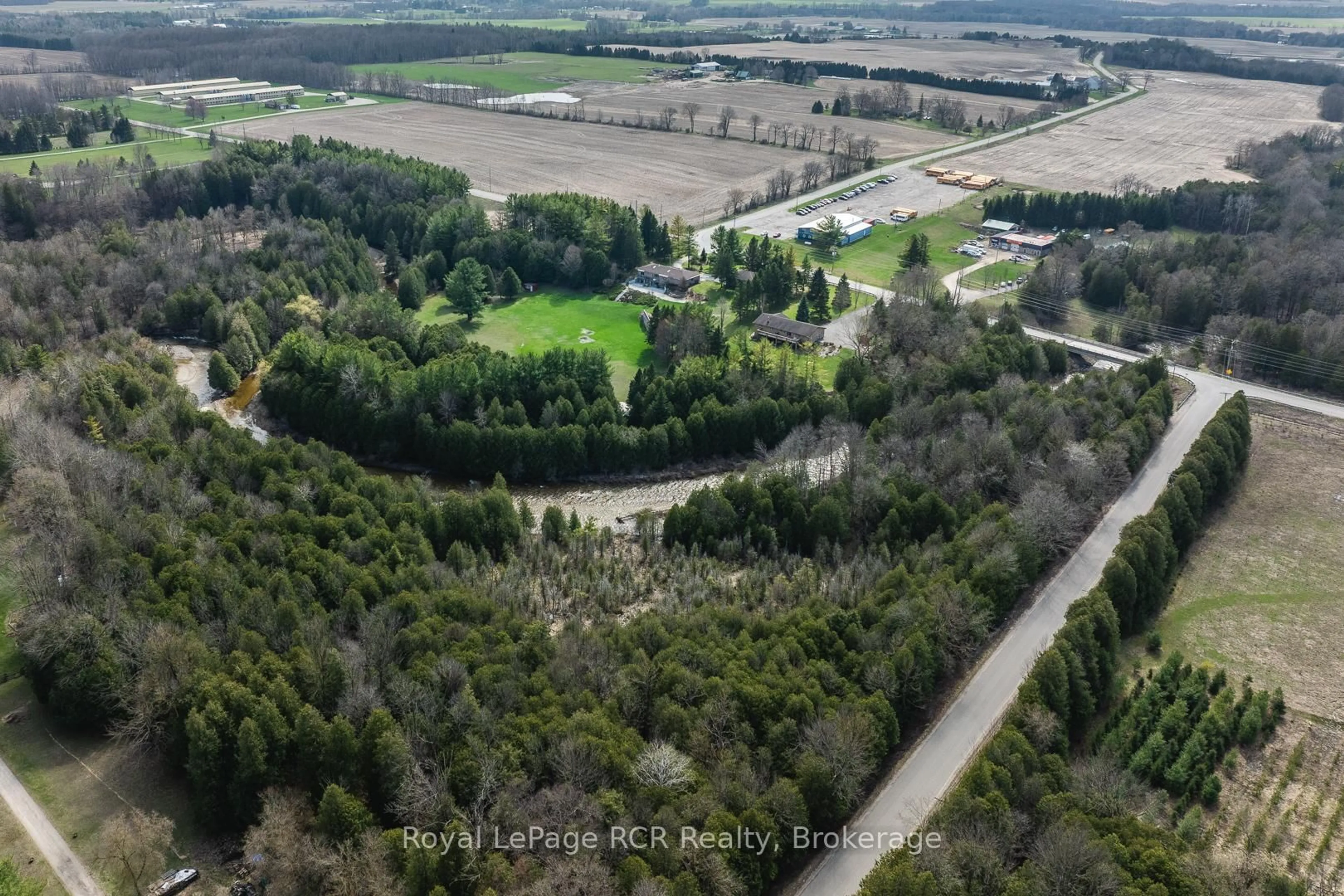 A pic from outside/outdoor area/front of a property/back of a property/a pic from drone, forest/trees view for 033105 Grey Road 28 Rd, West Grey Ontario N4N 3B8