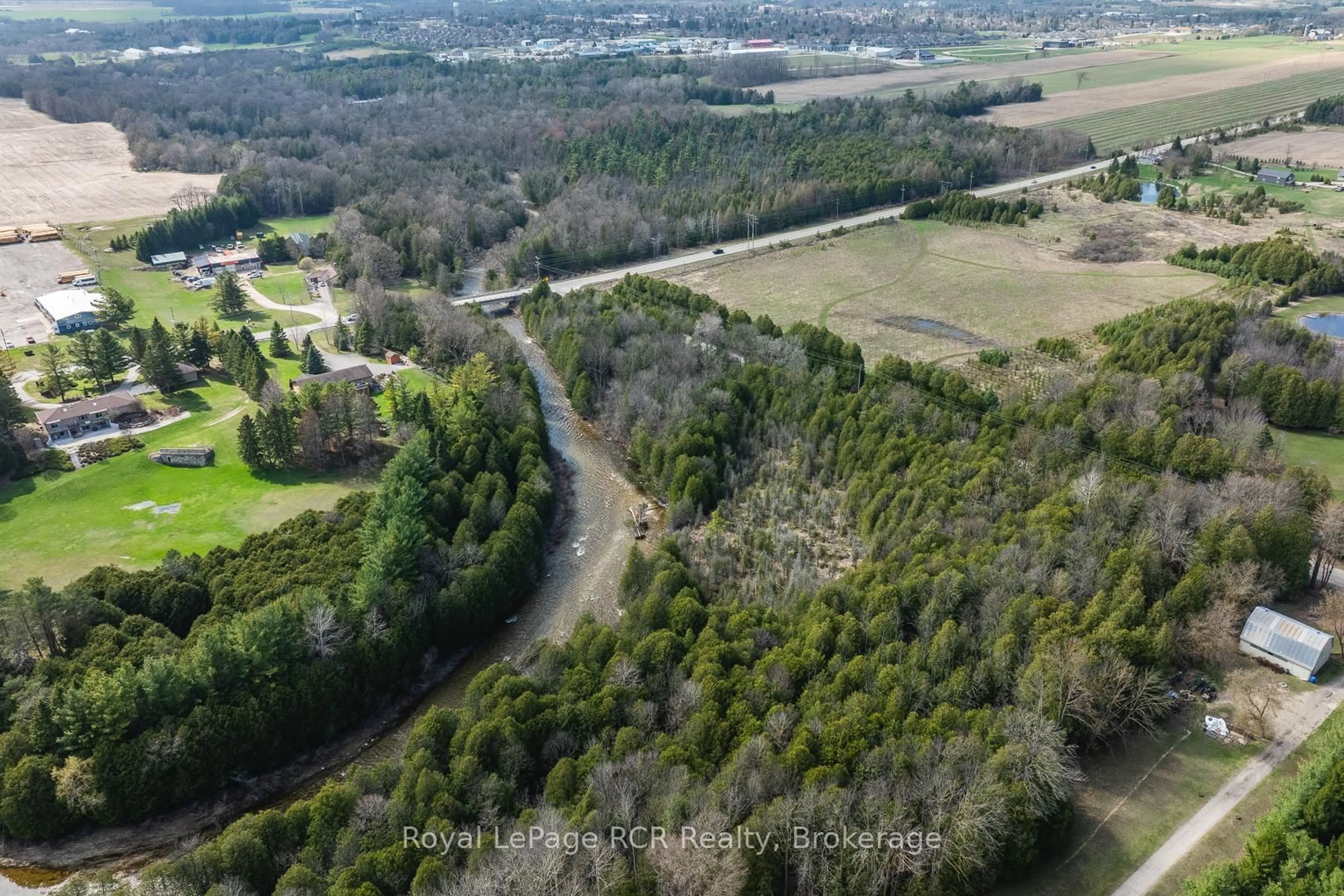 A pic from outside/outdoor area/front of a property/back of a property/a pic from drone, forest/trees view for 033105 Grey Road 28 Rd, West Grey Ontario N4N 3B8