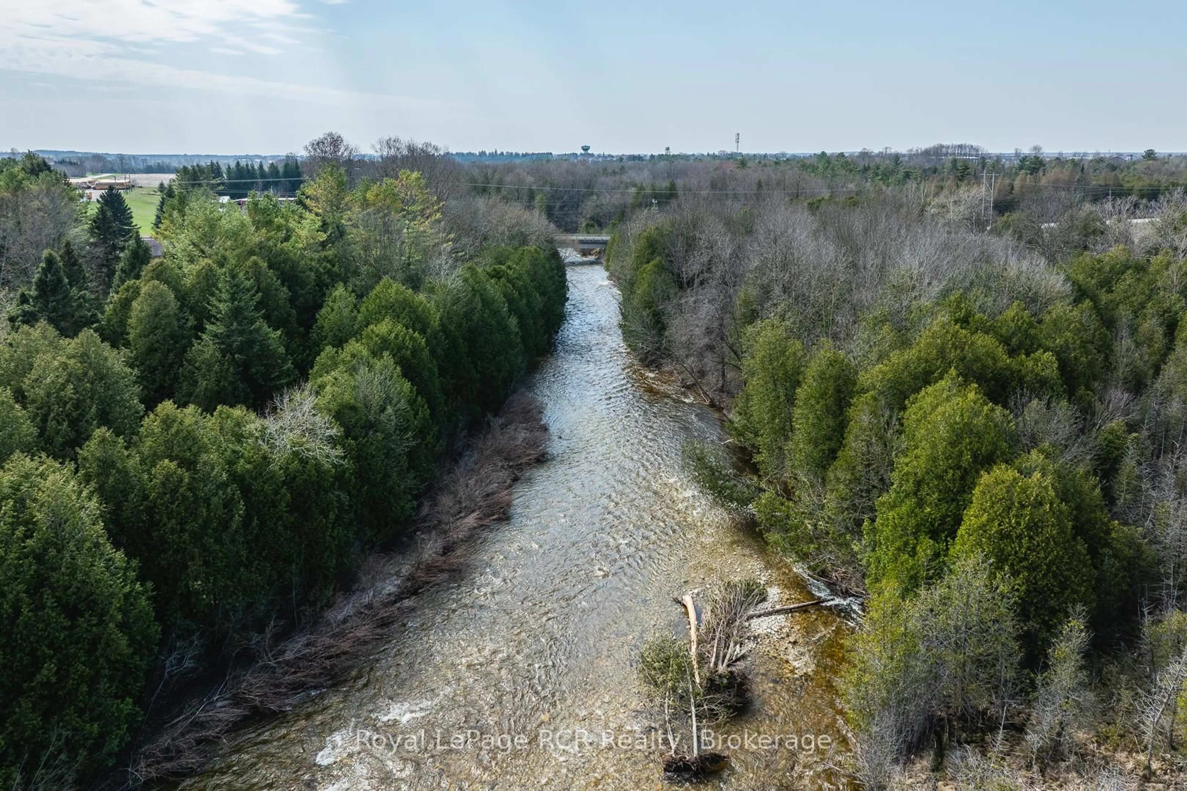 A pic from outside/outdoor area/front of a property/back of a property/a pic from drone, water/lake/river/ocean view for 033105 Grey Road 28 Rd, West Grey Ontario N4N 3B8