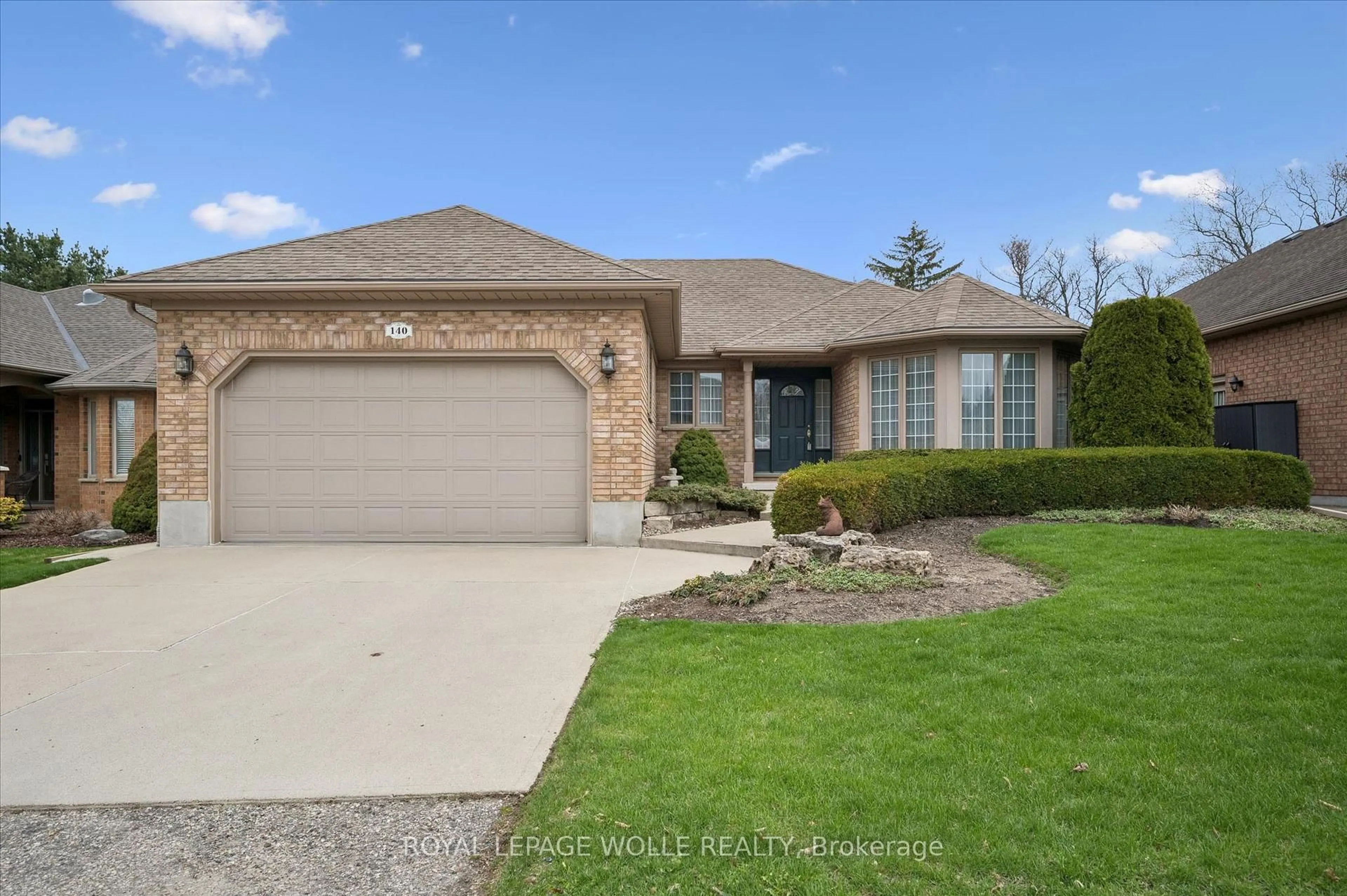 Home with brick exterior material, street for 140 Golf Links Dr, Wilmot Ontario N3A 3P1