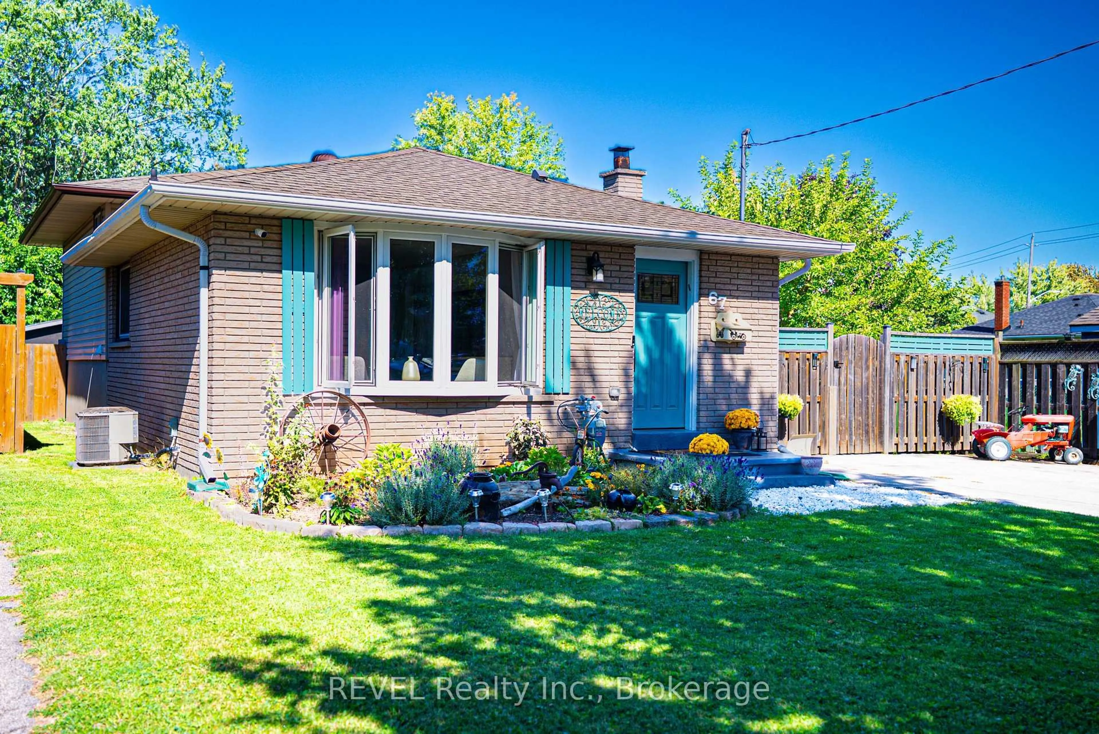 Home with brick exterior material, street for 67 Louis Ave, St. Catharines Ontario L2M 2N4