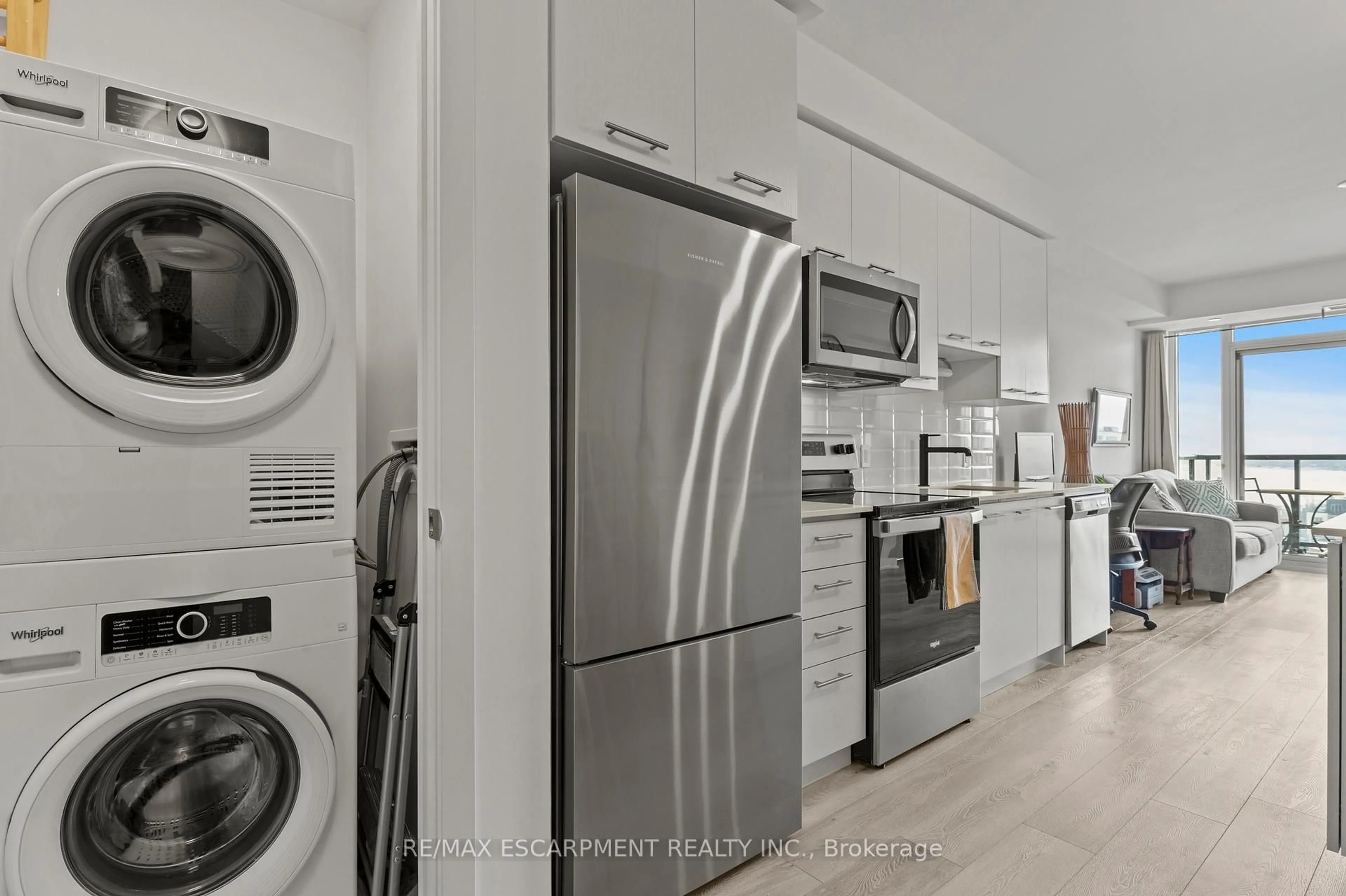 Kitchen with laundary machines, unknown for 385 Winston Rd #1110, Grimsby Ontario L3M 4E8