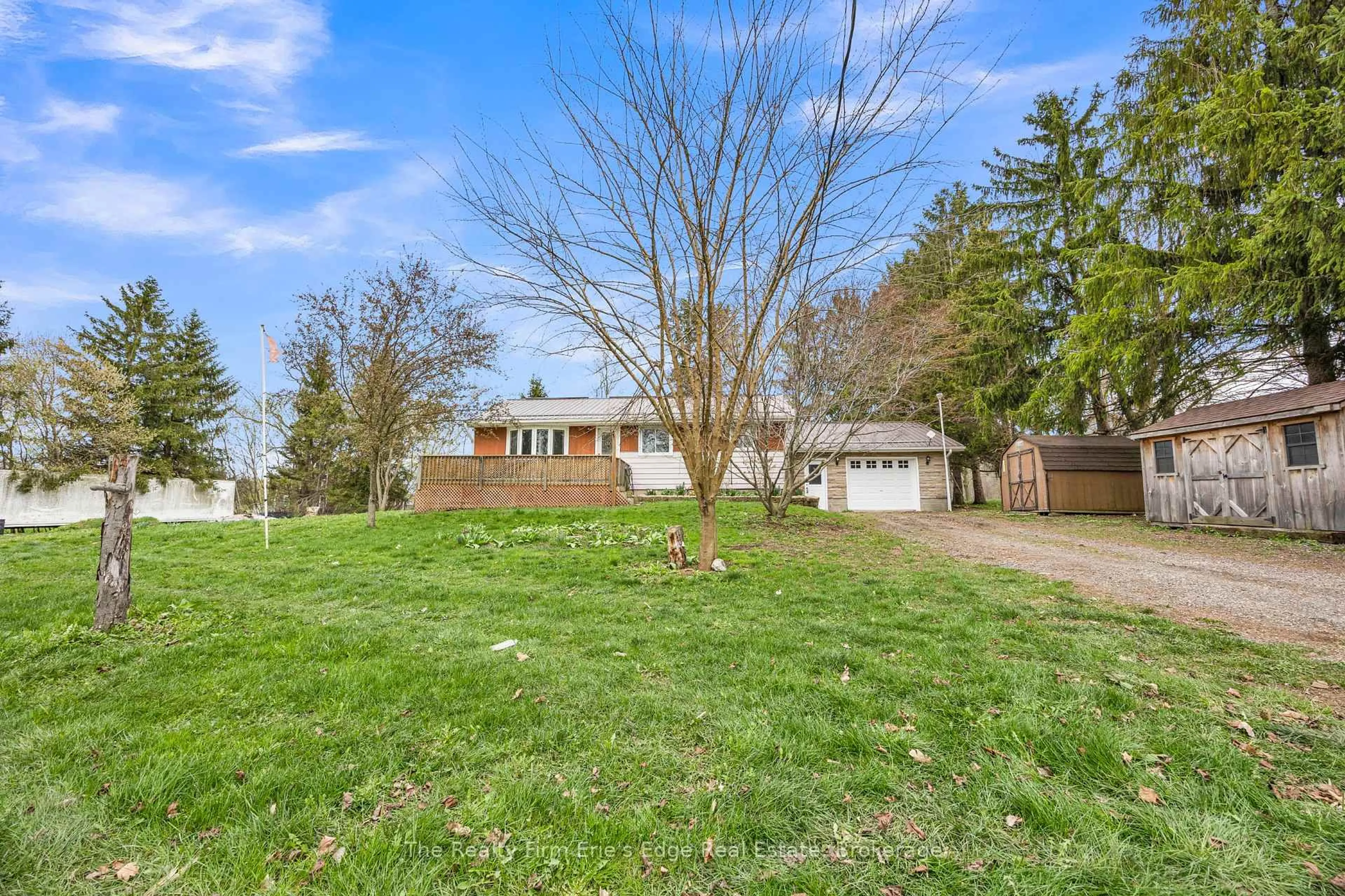 A pic from outside/outdoor area/front of a property/back of a property/a pic from drone, street for 185209 Cornell Rd, Norwich Ontario N4G 4G8